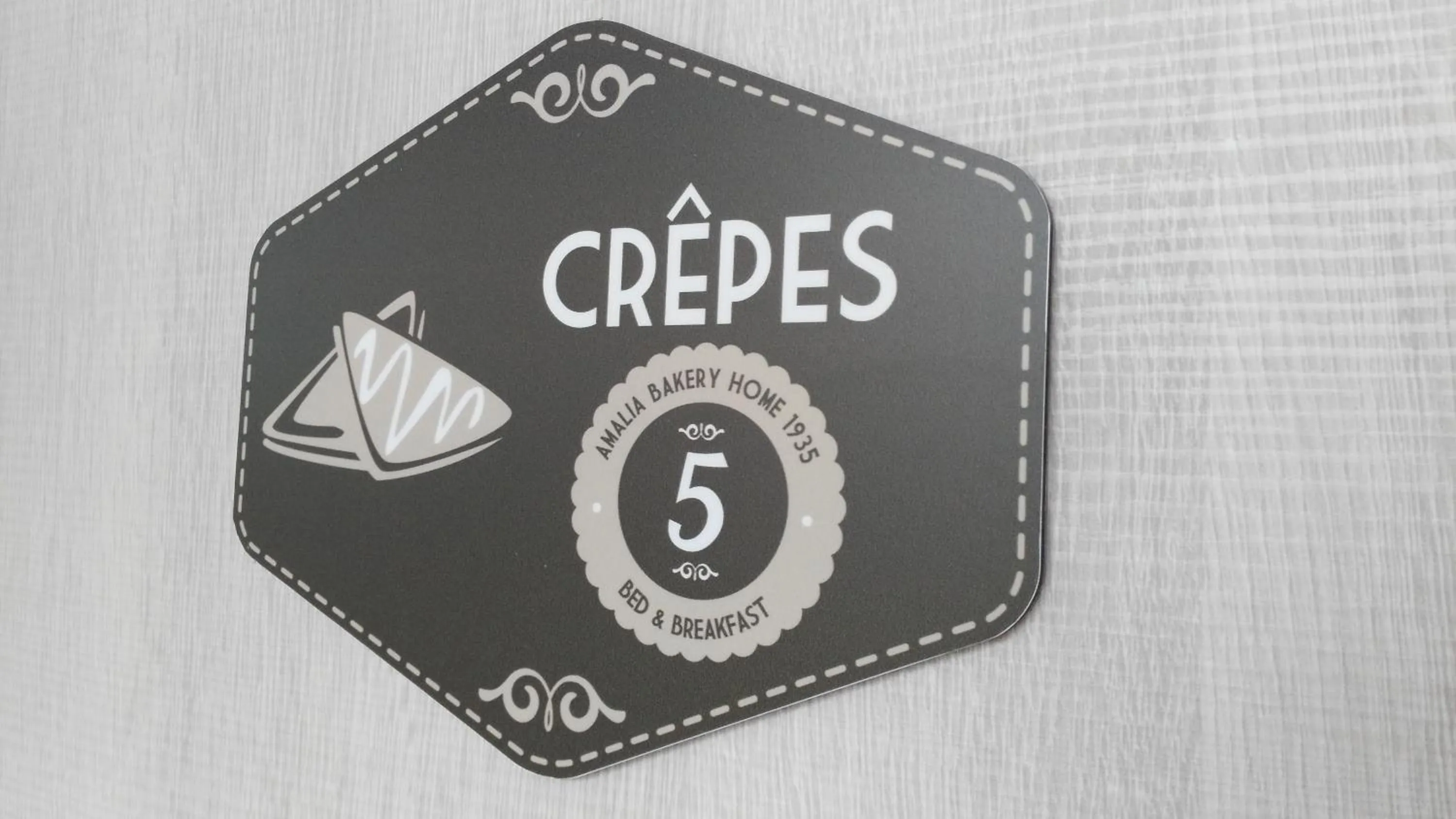 Property logo or sign in Amalia Bakery Home