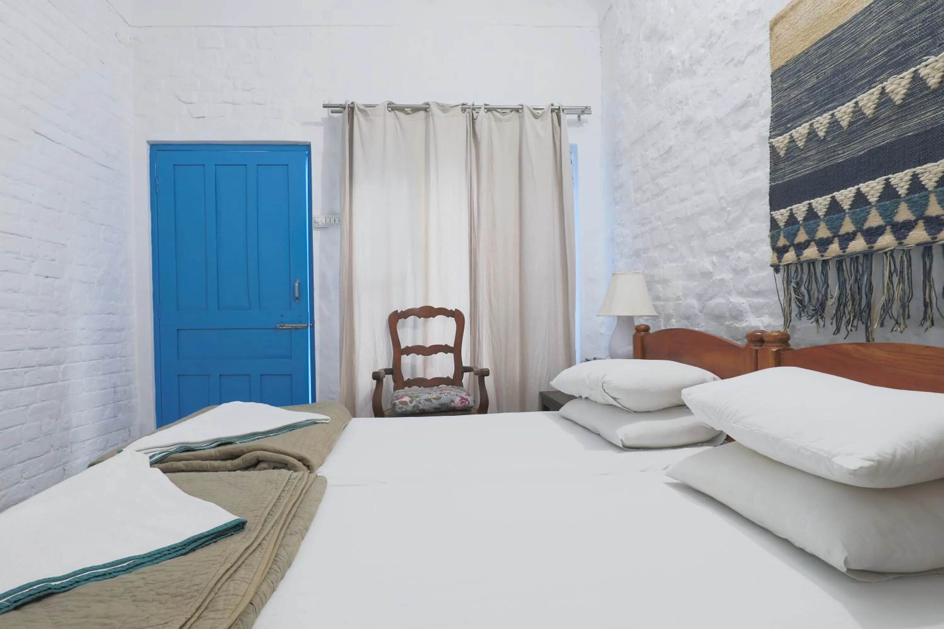 Bed in MANJARI RESORT