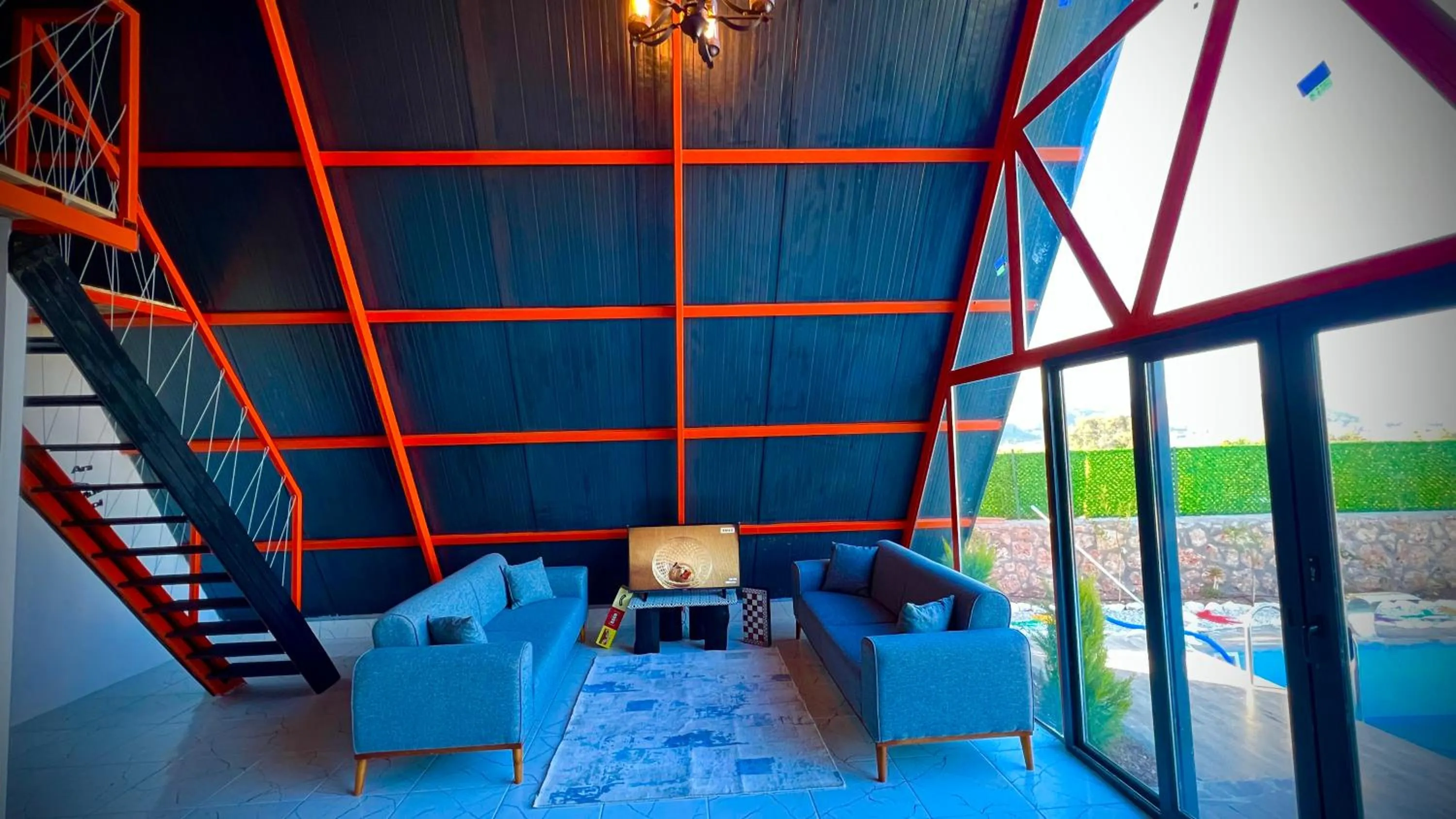 Communal lounge/ TV room in villa hidden paradise garden