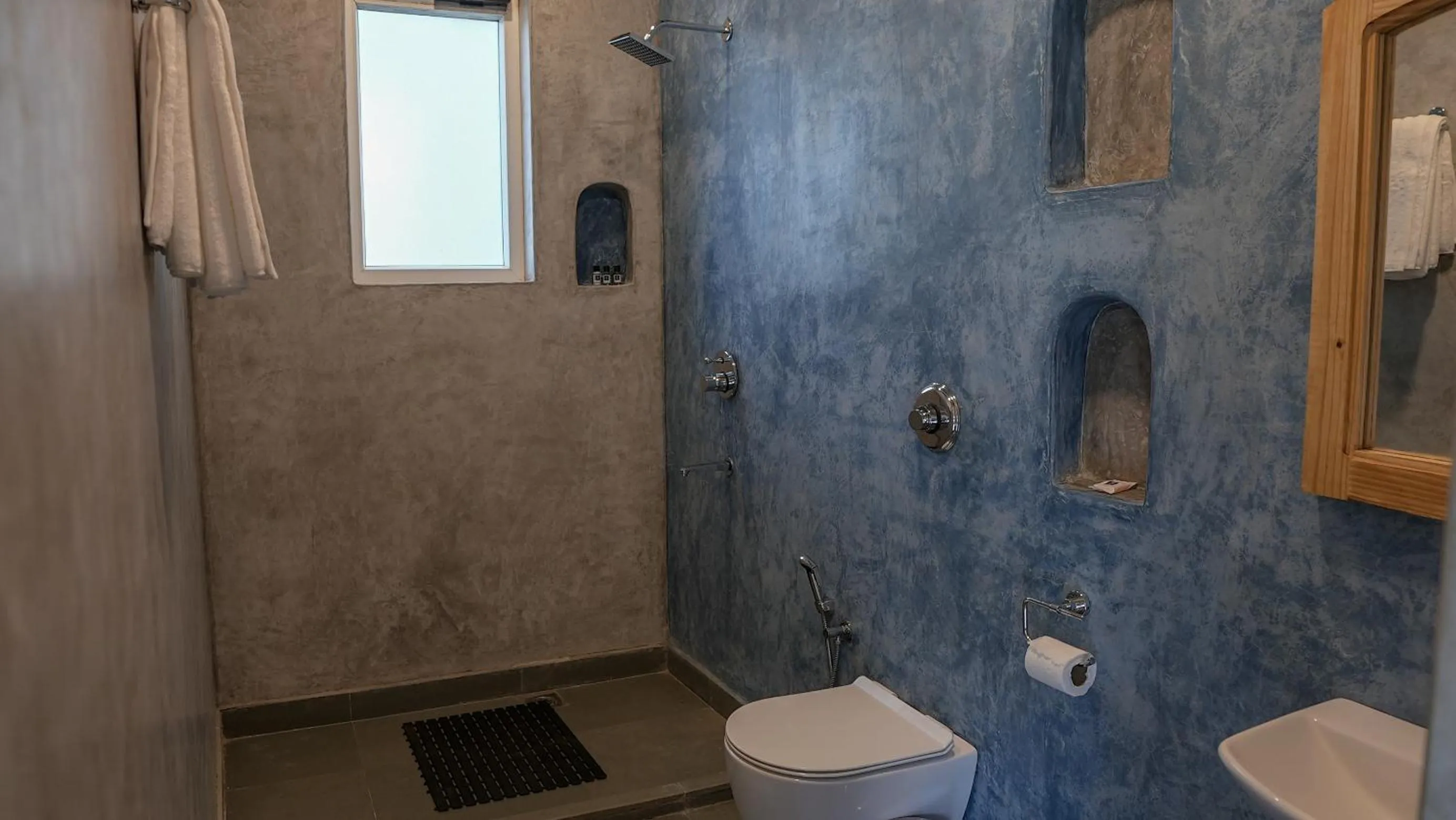 Shower in Whiteflower Resort Morjim