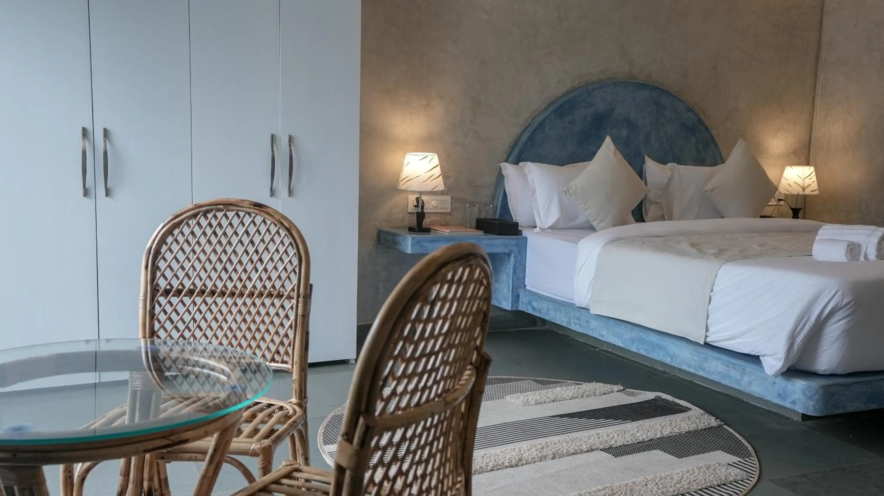 Bed in Whiteflower Resort Morjim