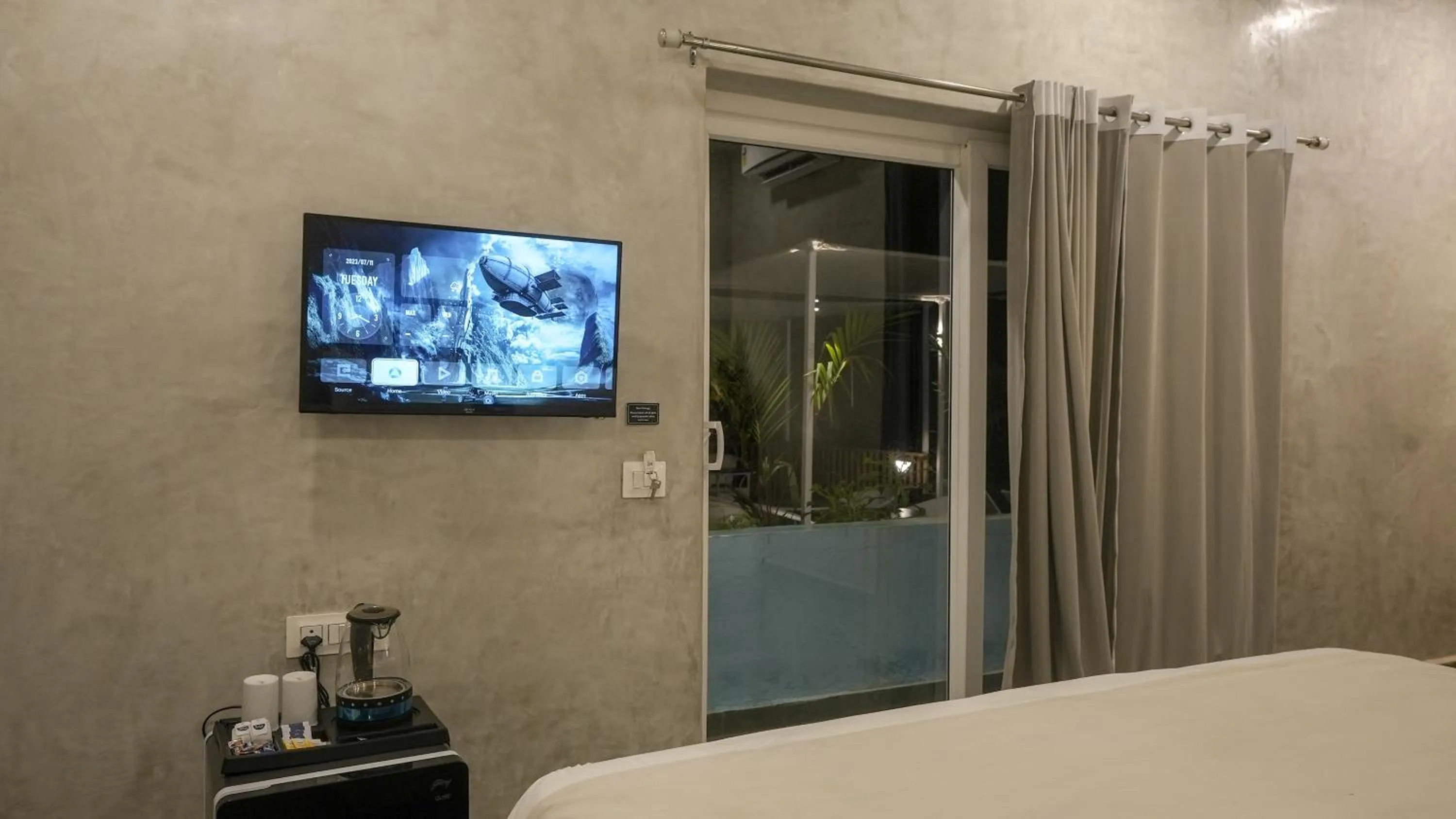 Bed in Whiteflower Resort Morjim