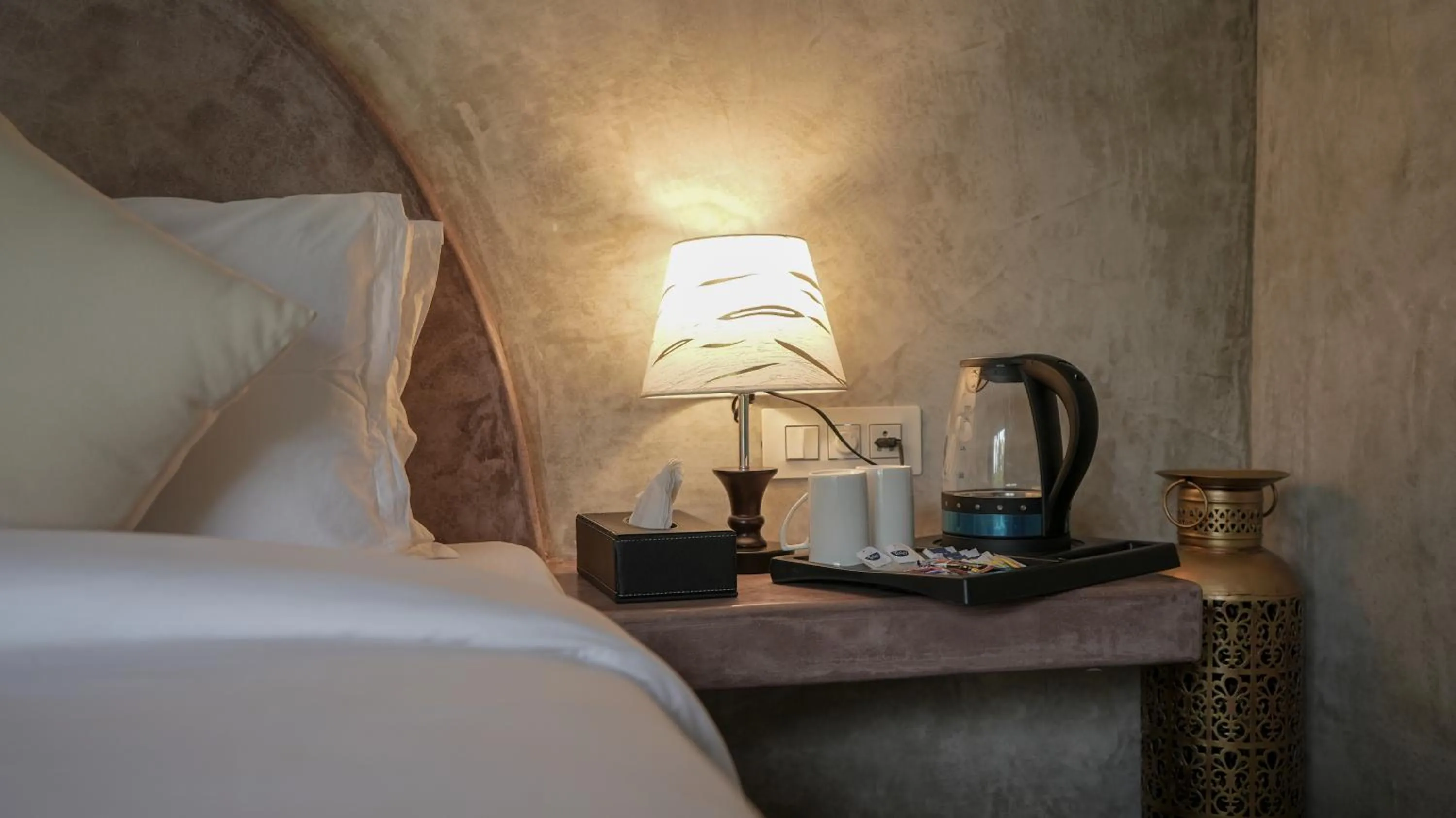 Bed in Whiteflower Resort Morjim