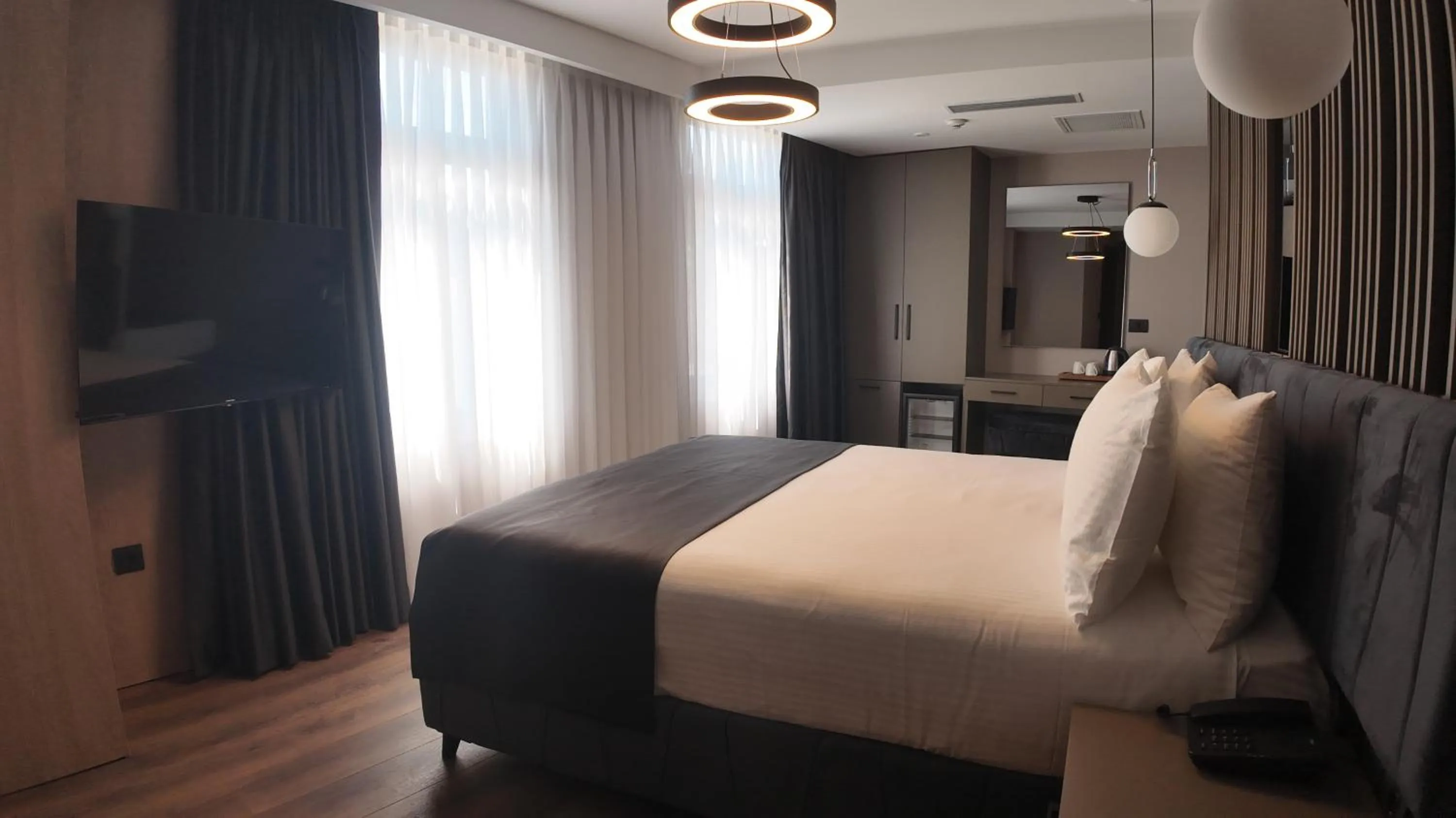 Bed in THE NEST HOTEL