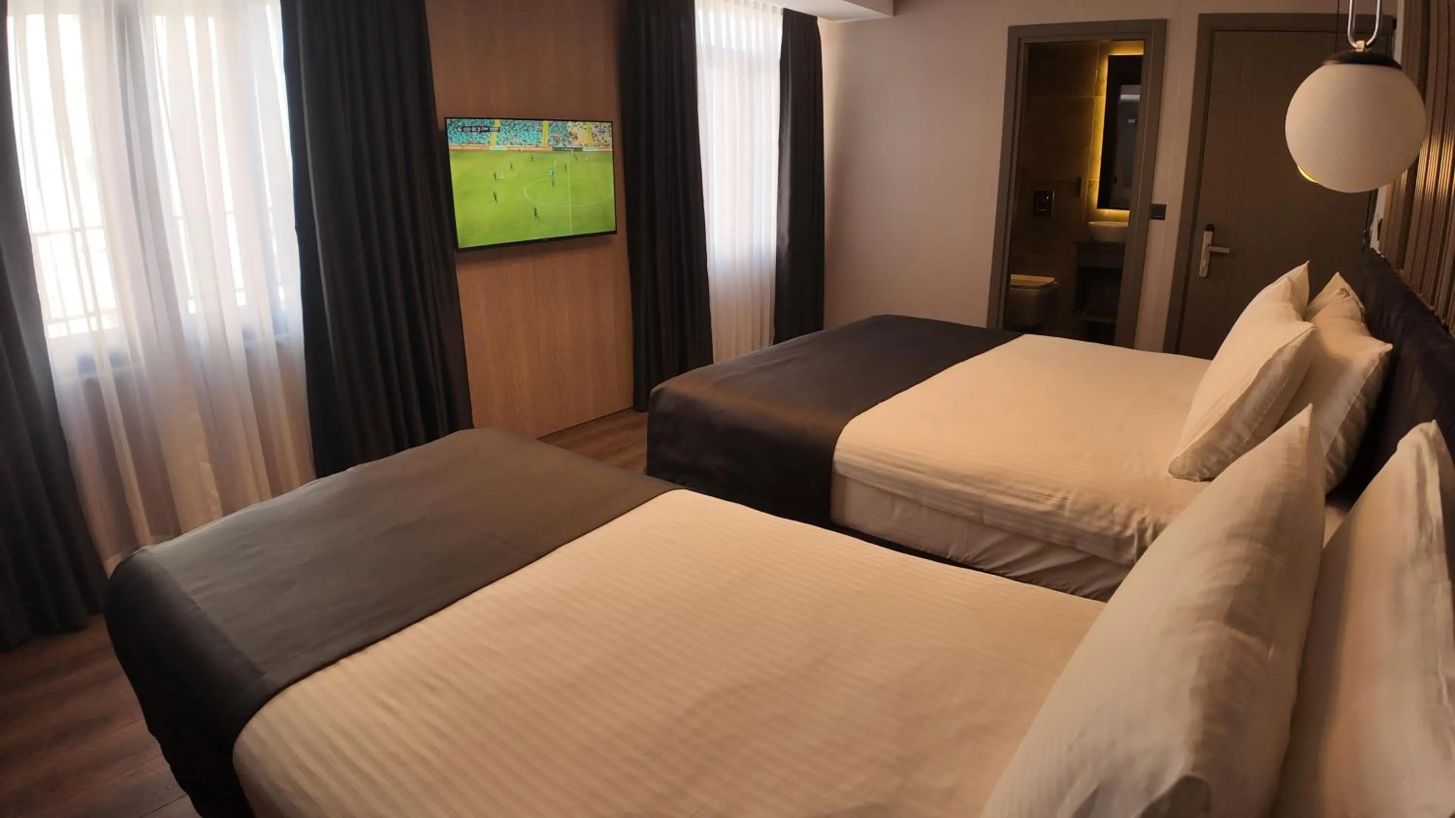 TV and multimedia, Bed in THE NEST HOTEL