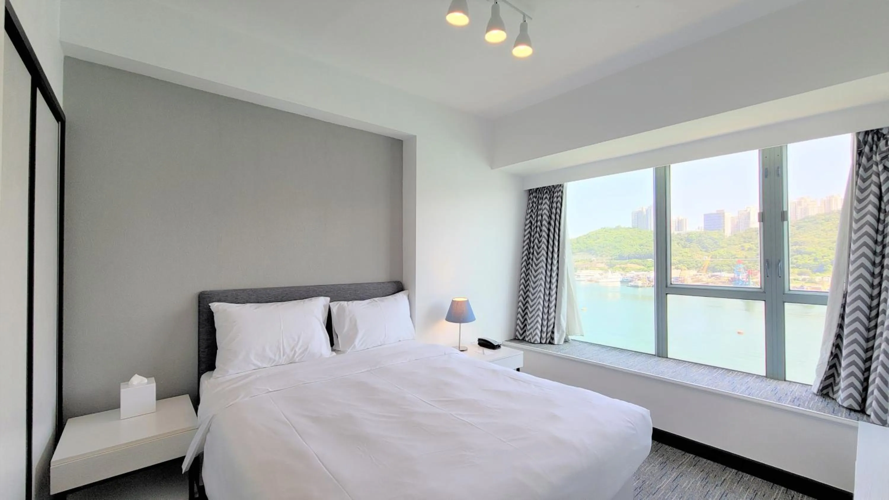 Bed in Grand Bay View Hotel