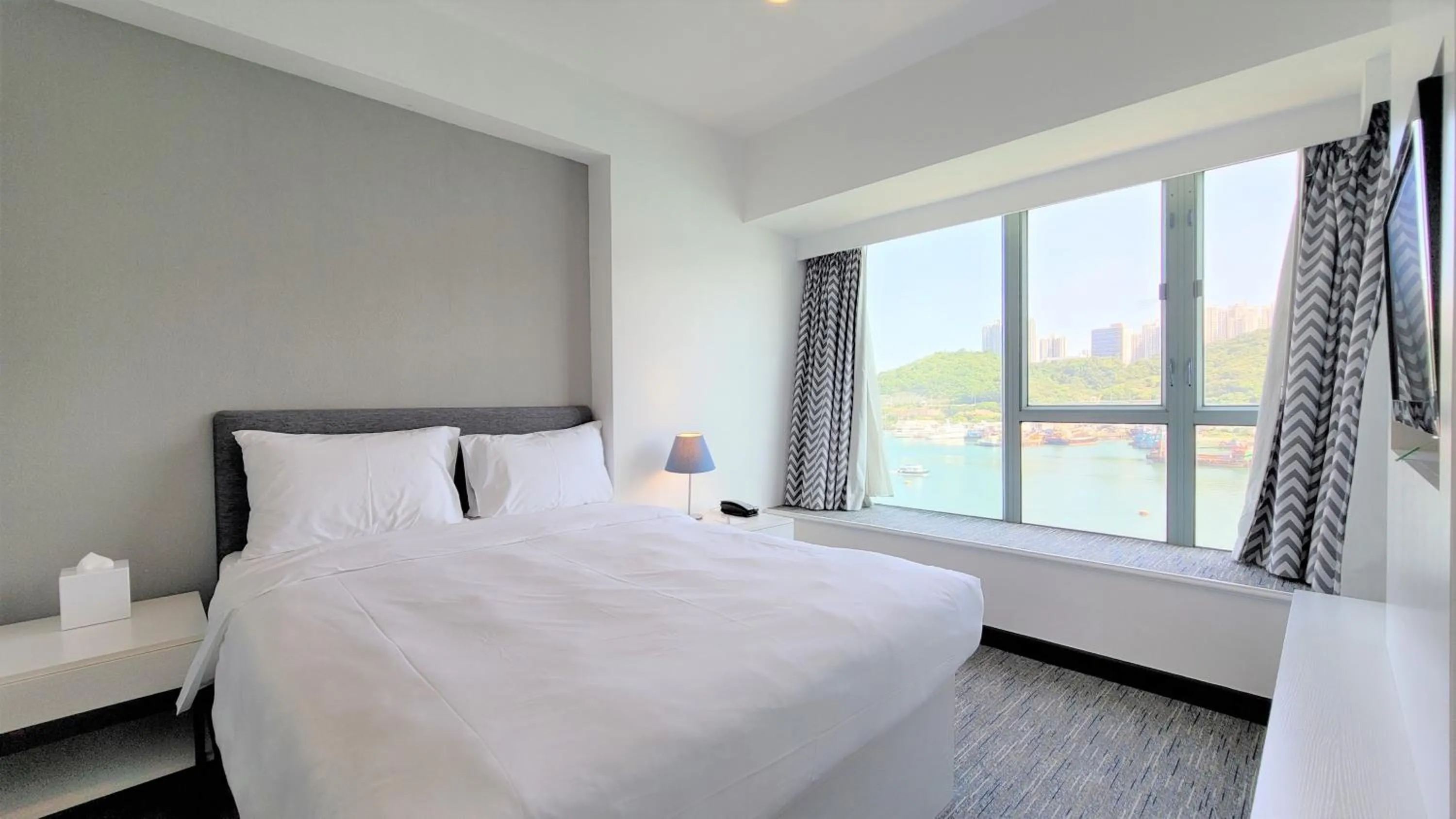 Bed in Grand Bay View Hotel