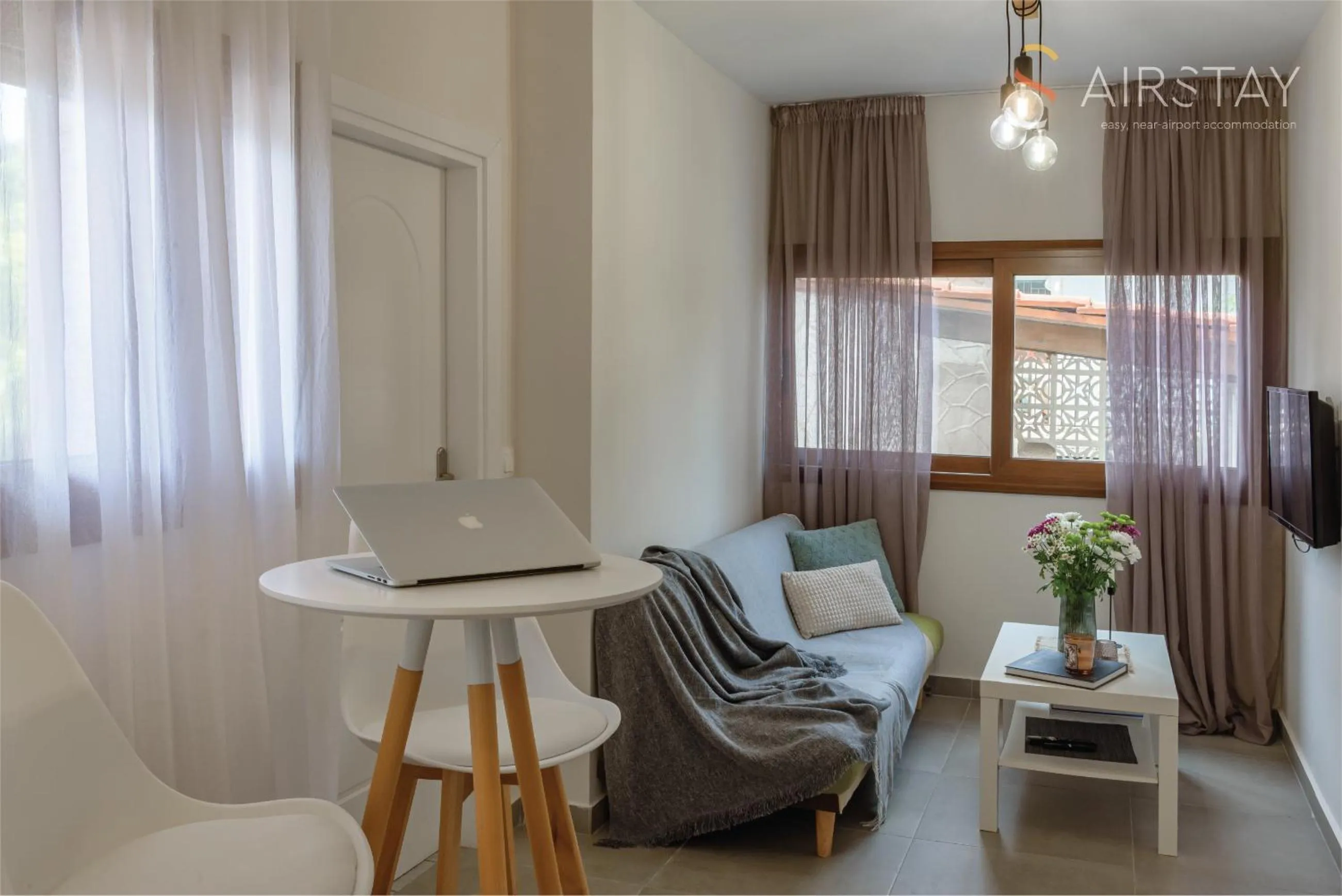 Living room in Ryze Apartments Airport by Airstay