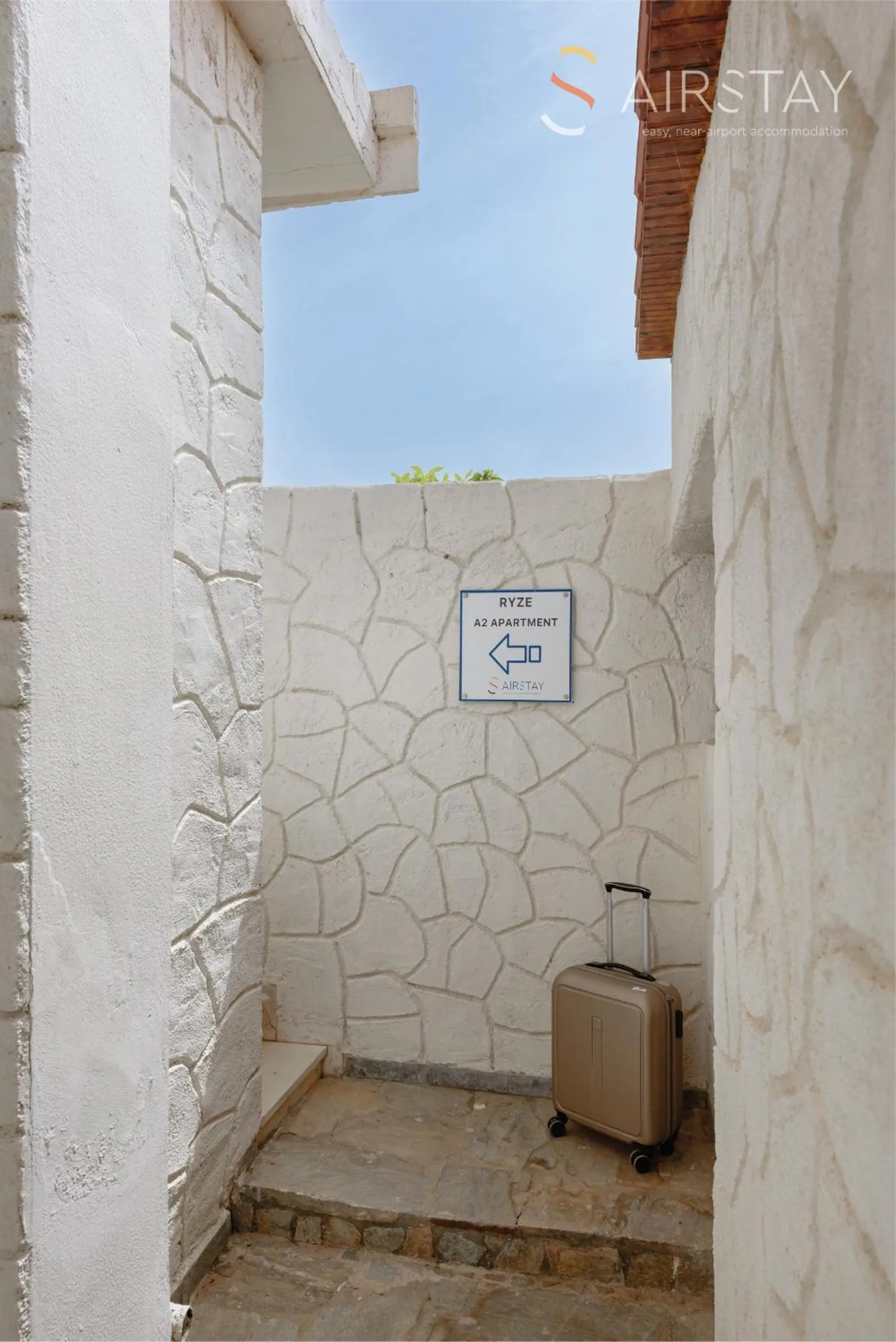 Property logo or sign in Ryze Apartments Airport by Airstay