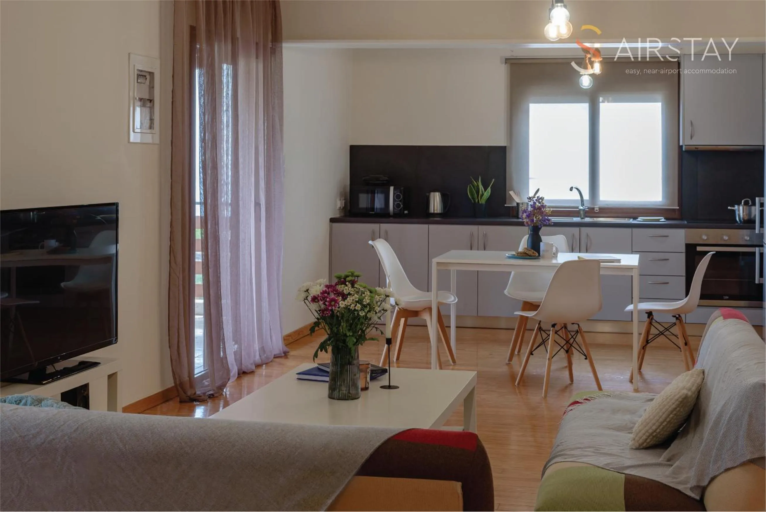 Seating area in Ryze Apartments Airport by Airstay