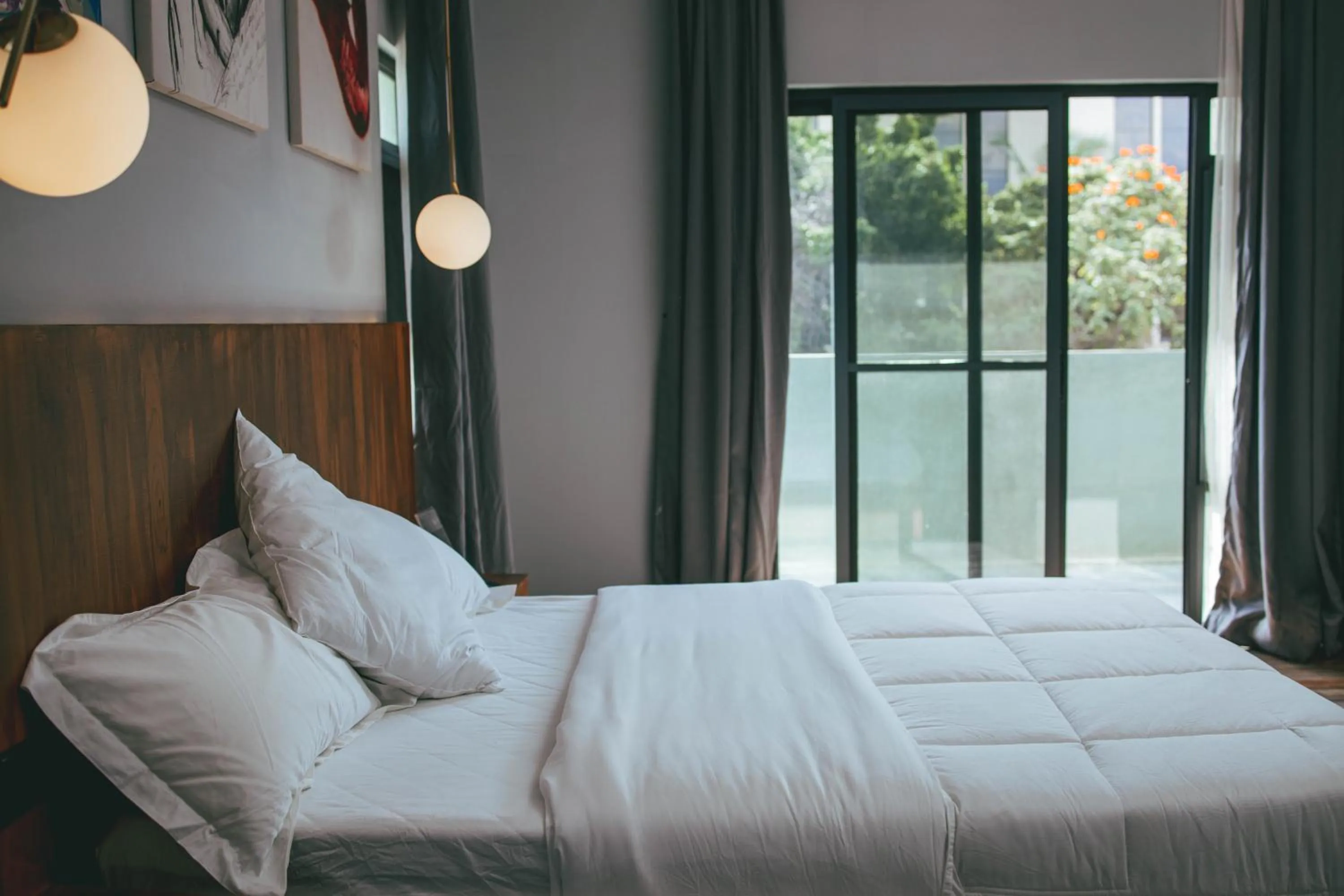 Bed in Burundi Palace Boutique Hotel