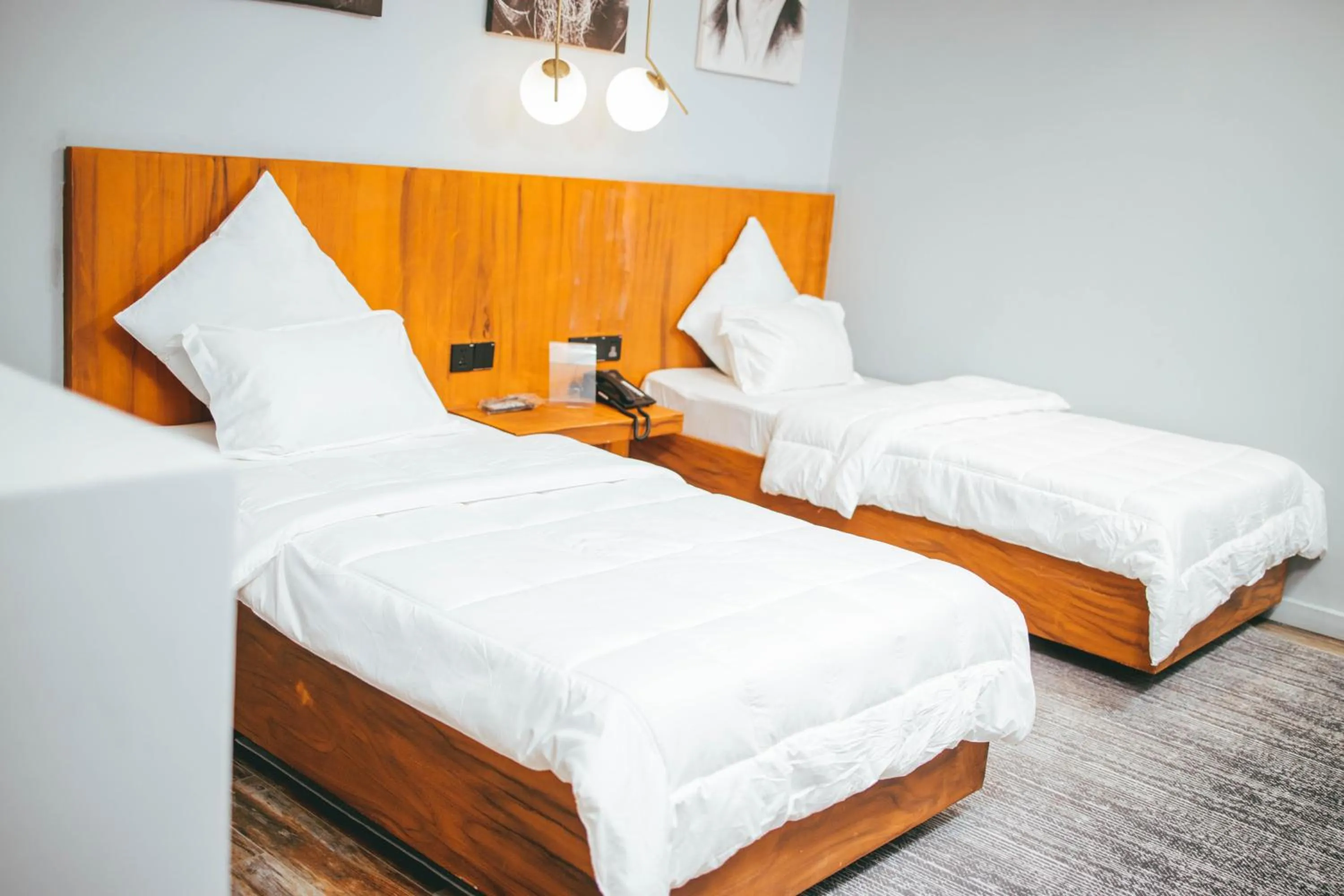 Bed in Burundi Palace Boutique Hotel