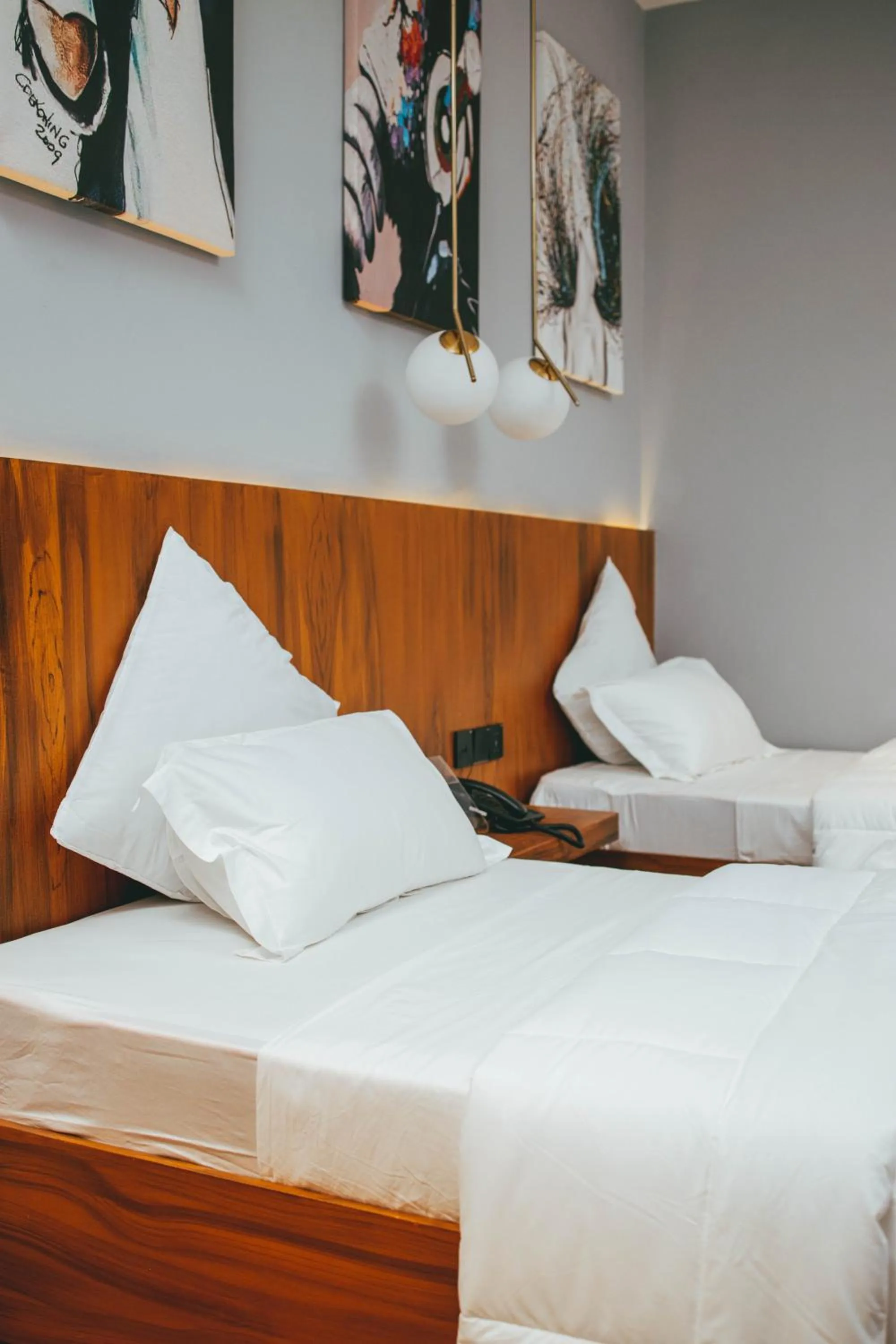 Bed in Burundi Palace Boutique Hotel