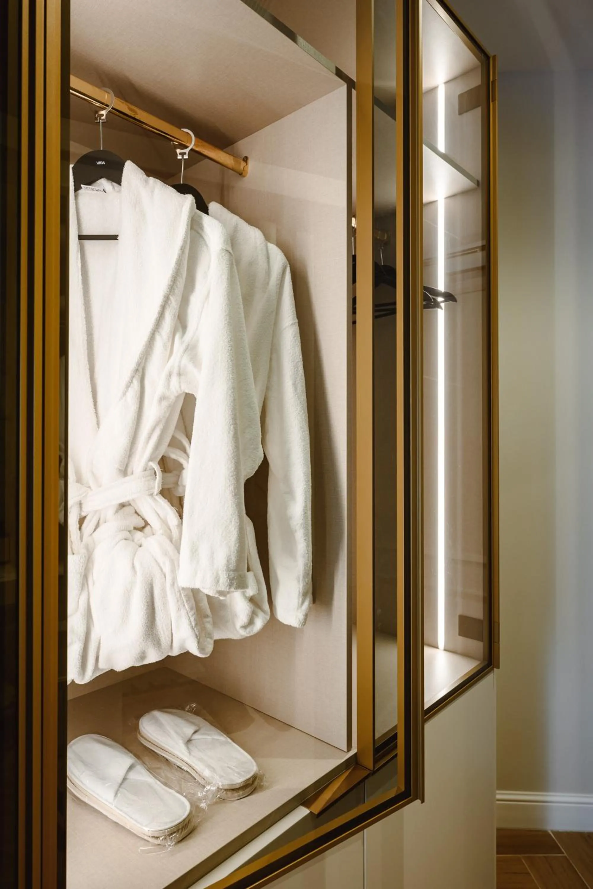 wardrobe in XVI Suites - Adults Only