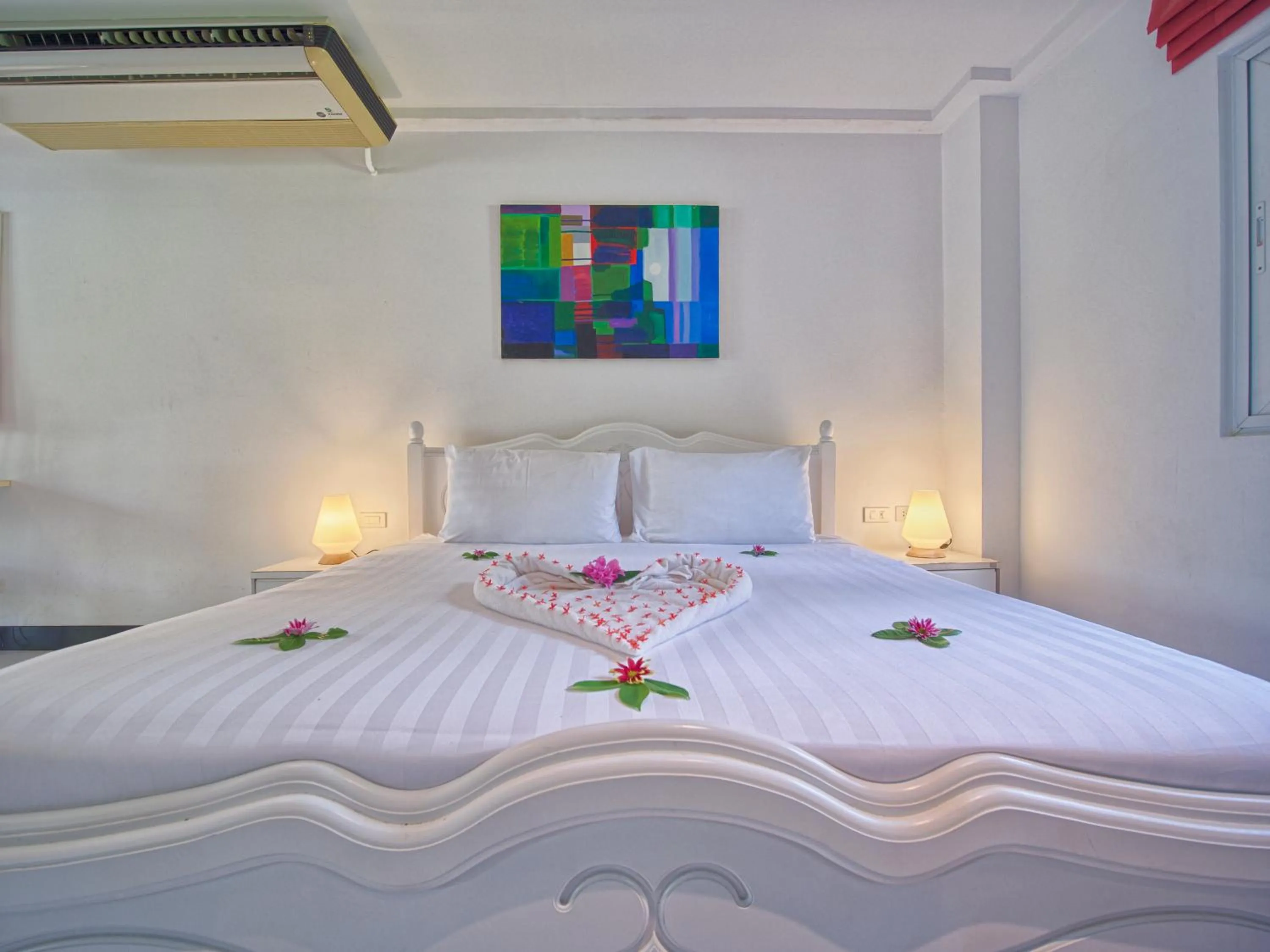 Bed in Serenity Lakeside Resort