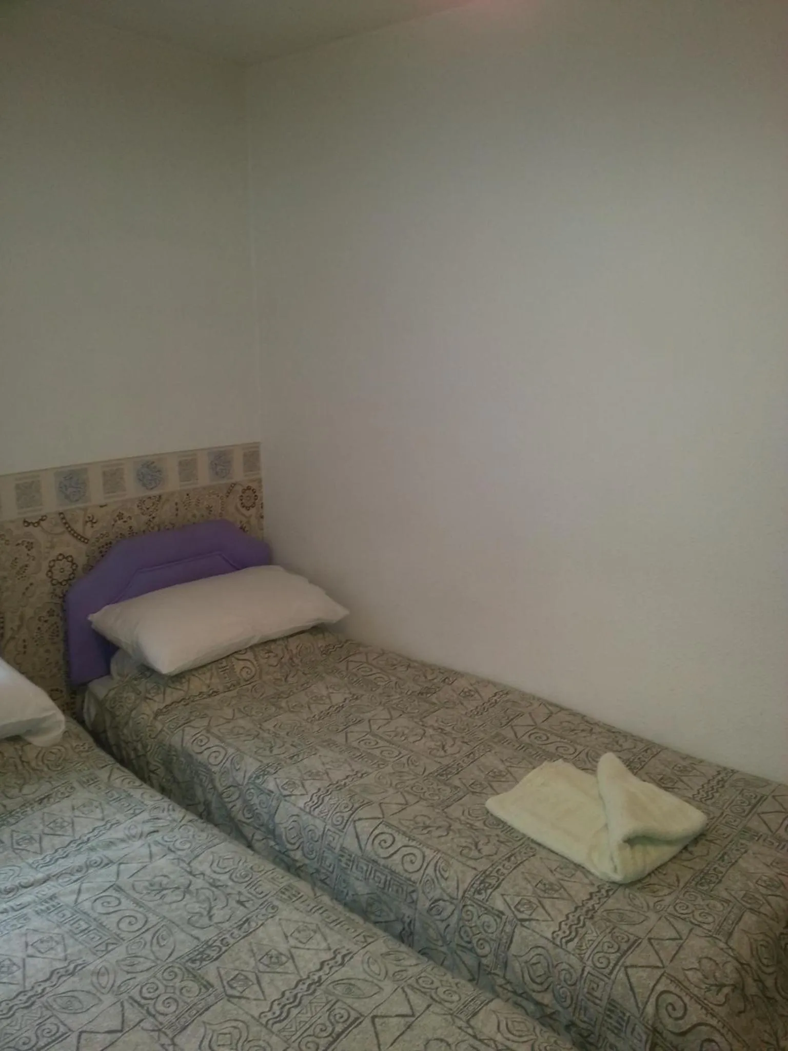 Bed in Jesmond International Hotel