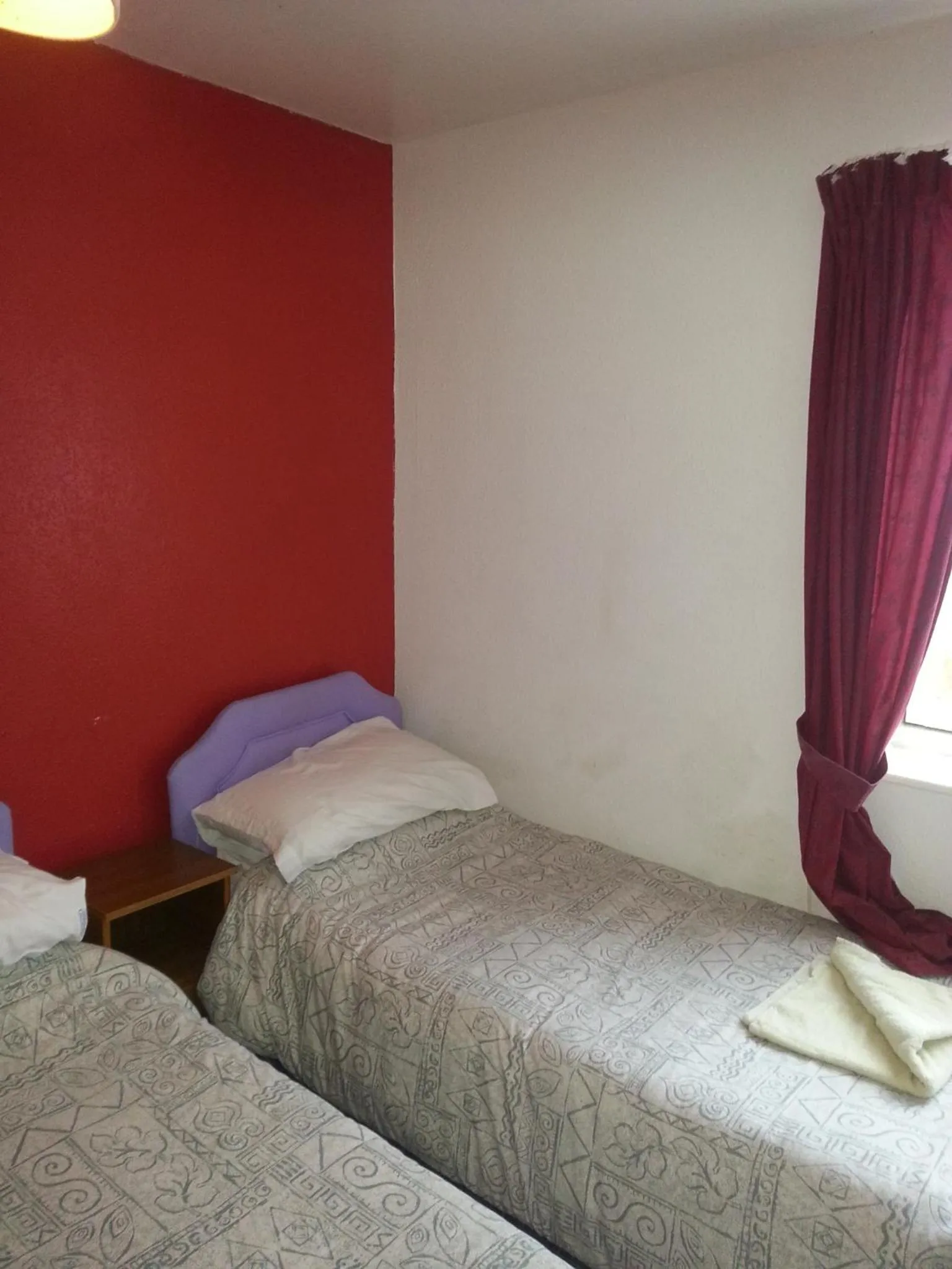 Bed in Jesmond International Hotel