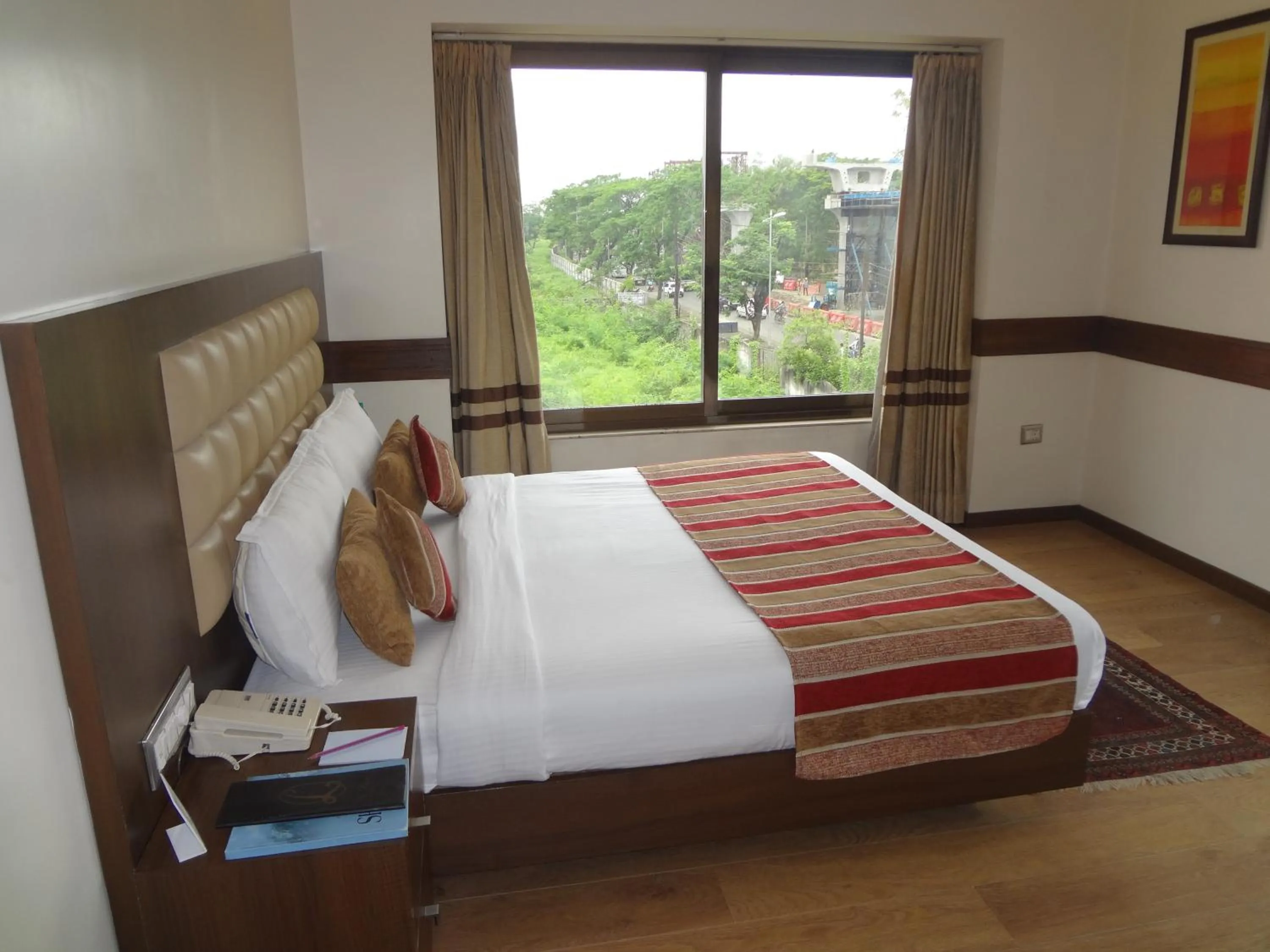 Bedroom, Bed in The Legend Inn @Nagpur