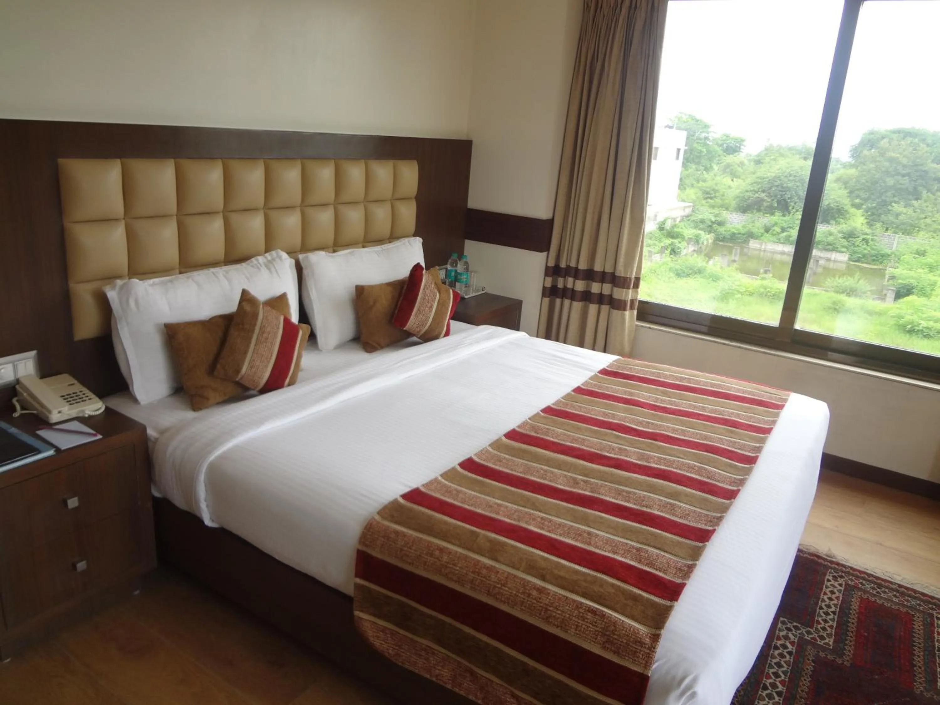 Bedroom, Bed in The Legend Inn @Nagpur