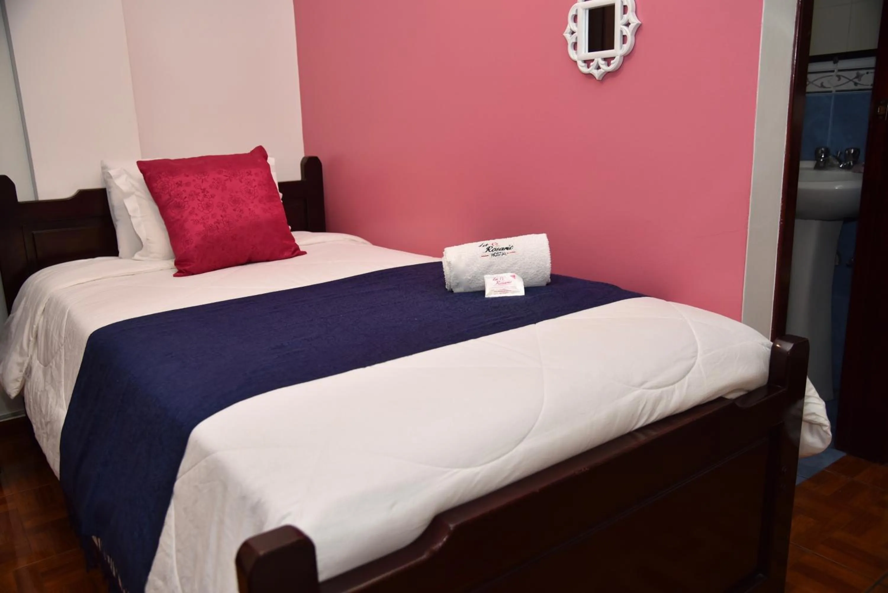 Bed in La Rosario Hotel