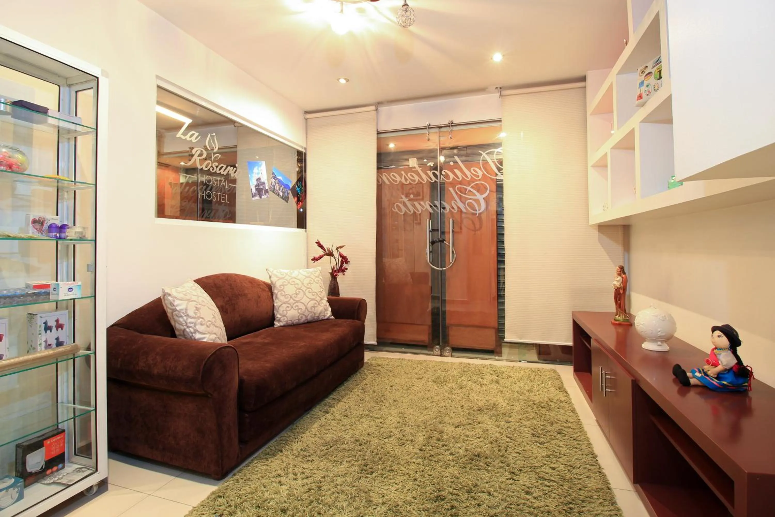 Communal lounge/ TV room in La Rosario Hotel