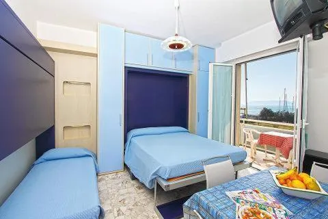 Photo of the whole room, Bed in Residence Riviera