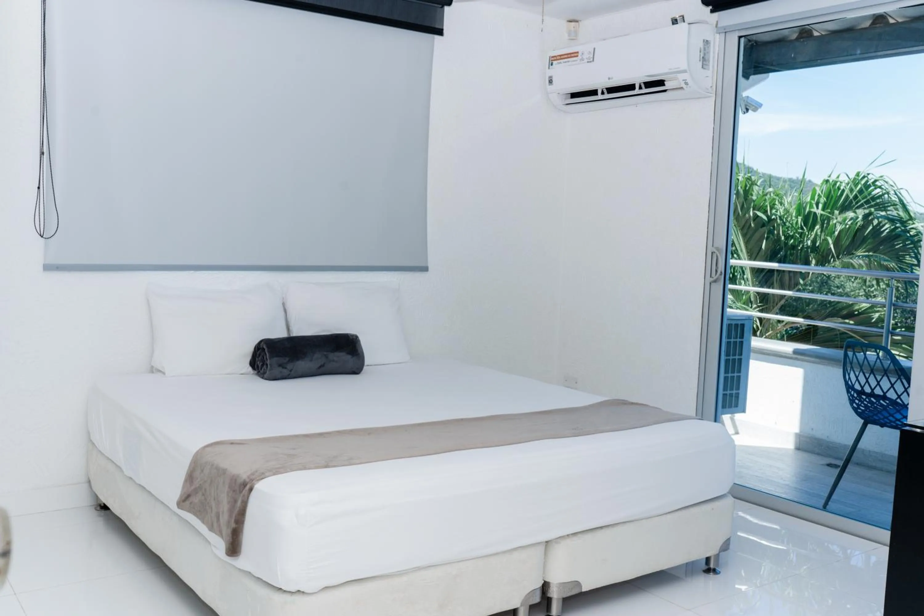 Bed in Hotel Kaamú Taganga