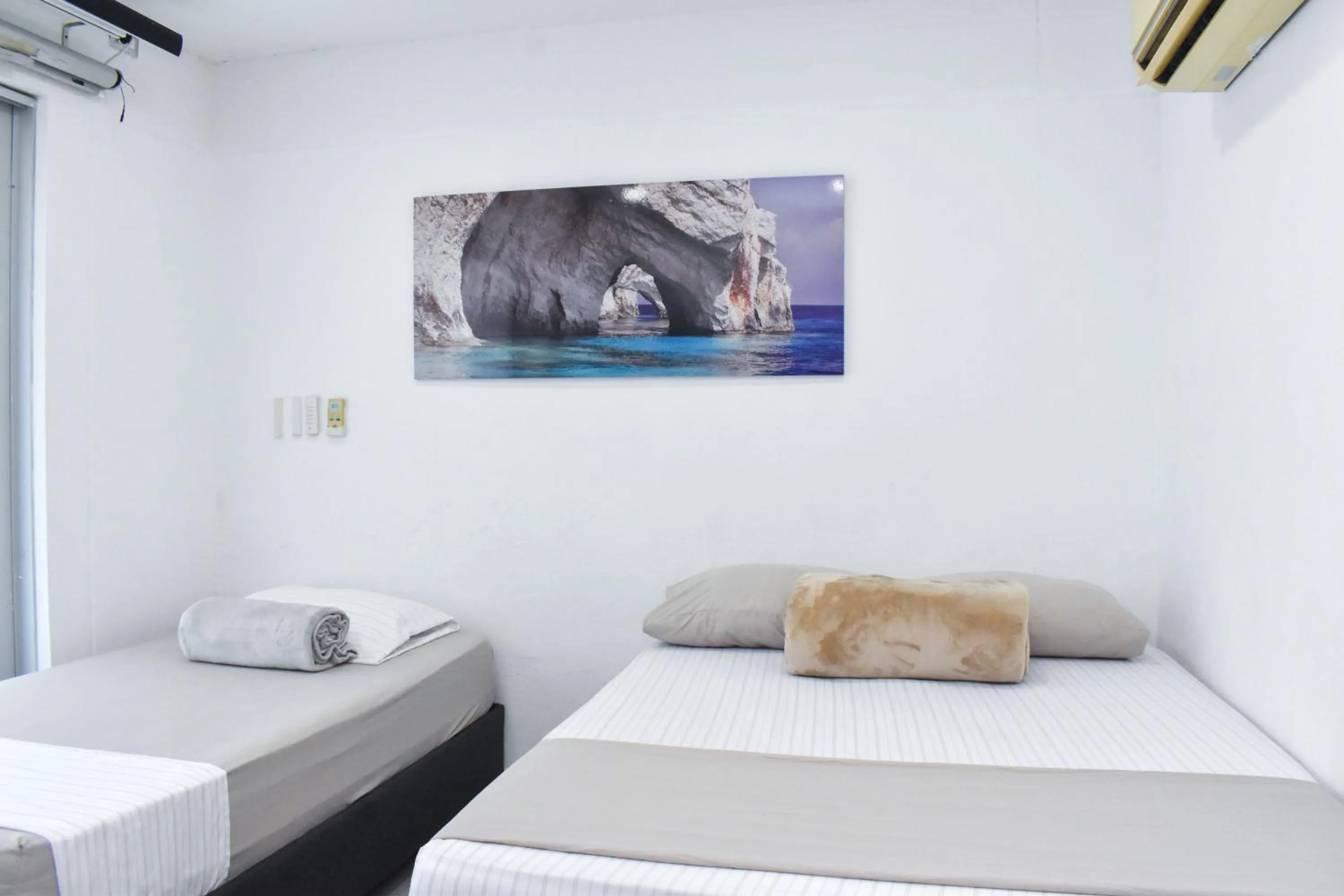 Bed in Hotel Kaamú Taganga