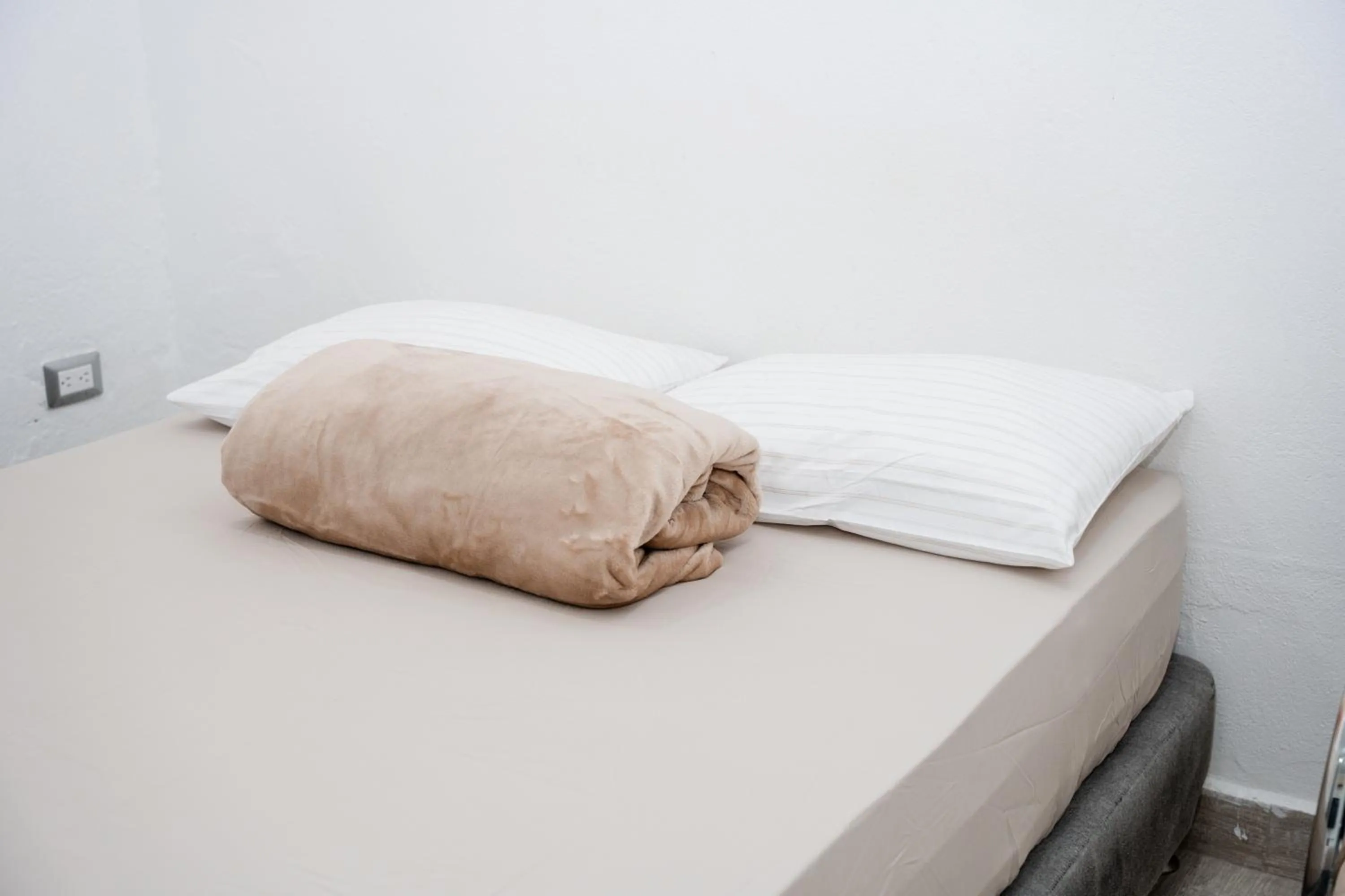 Bed in Hotel Kaamú Taganga