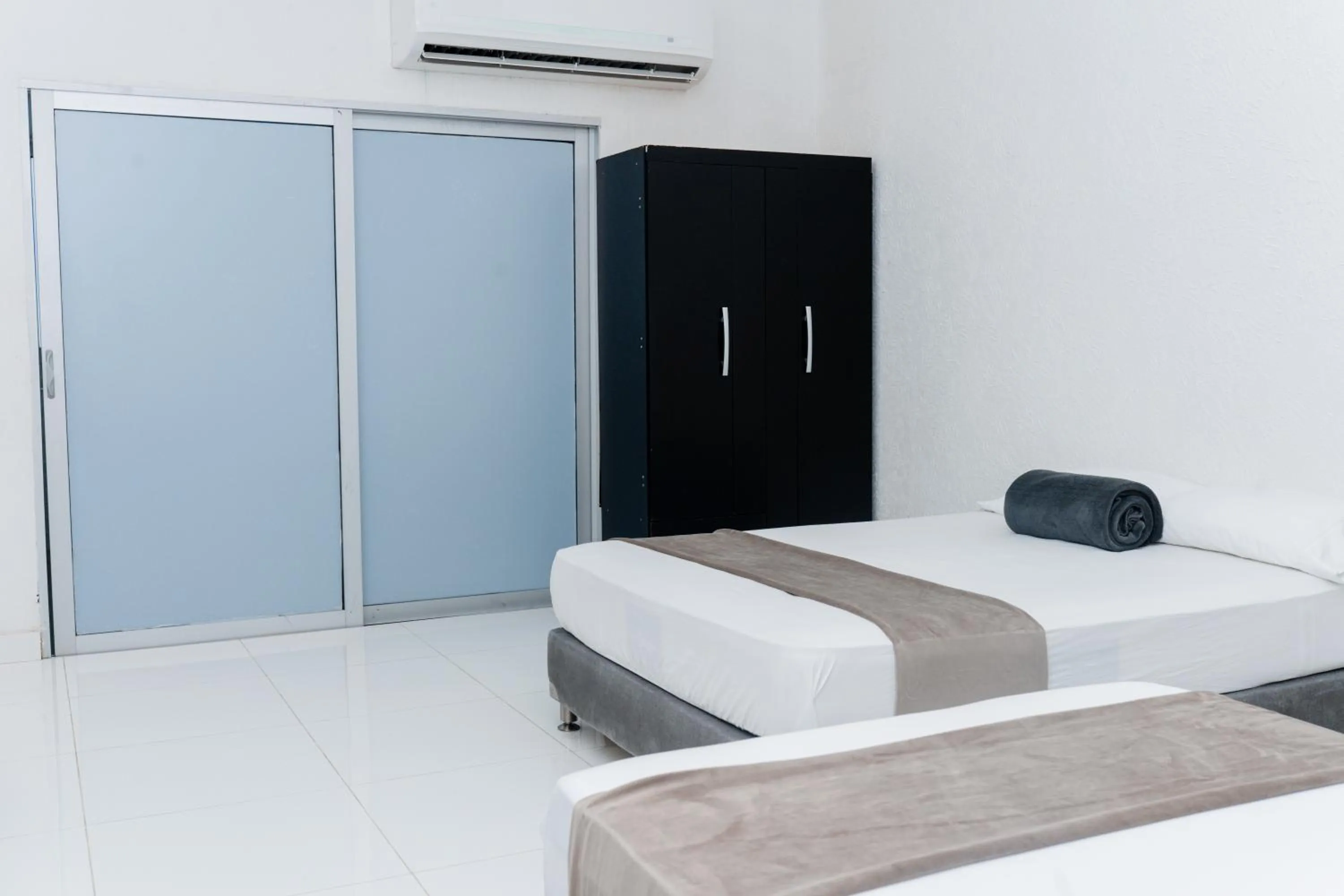 Bed in Hotel Kaamú Taganga