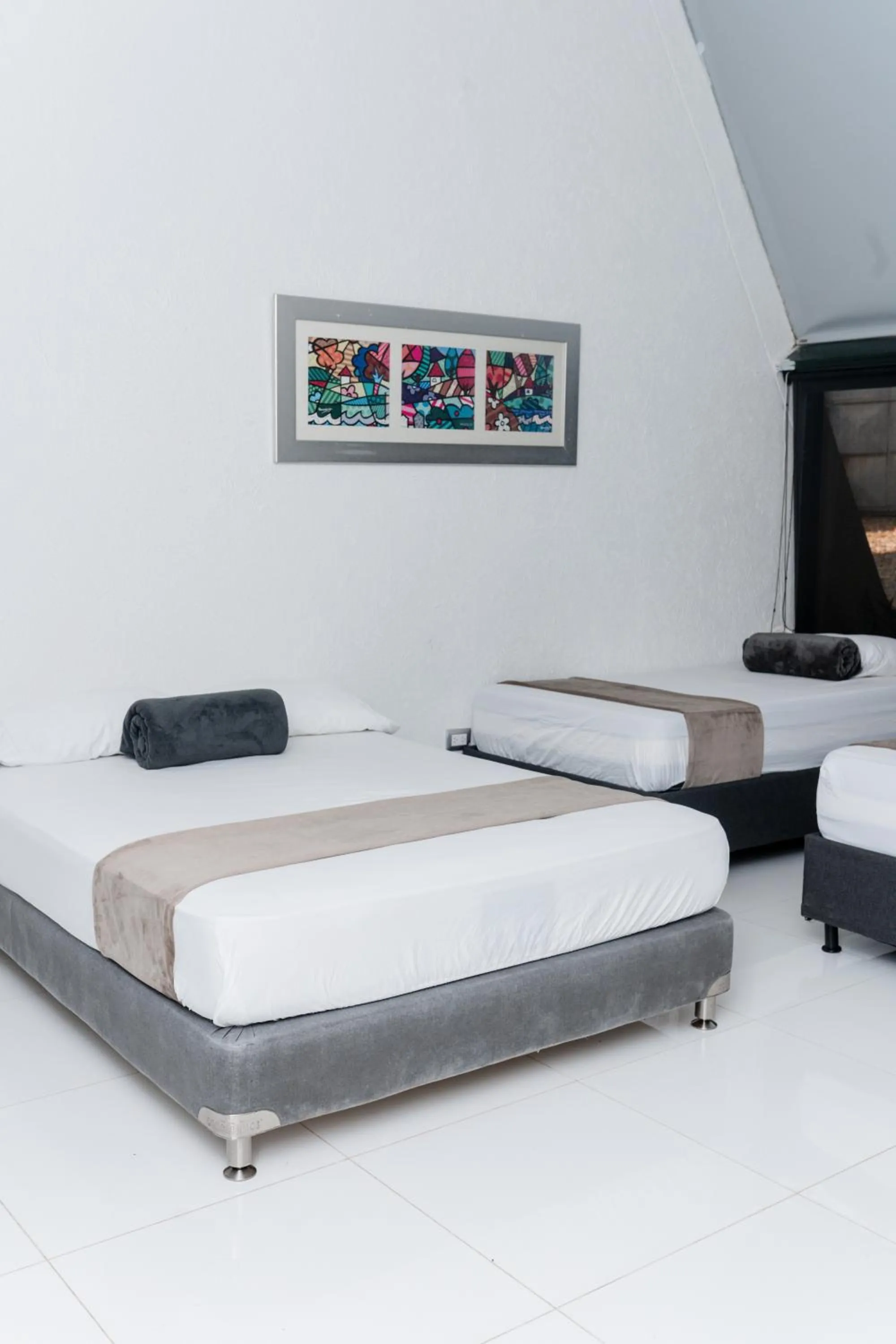 Bed in Hotel Kaamú Taganga