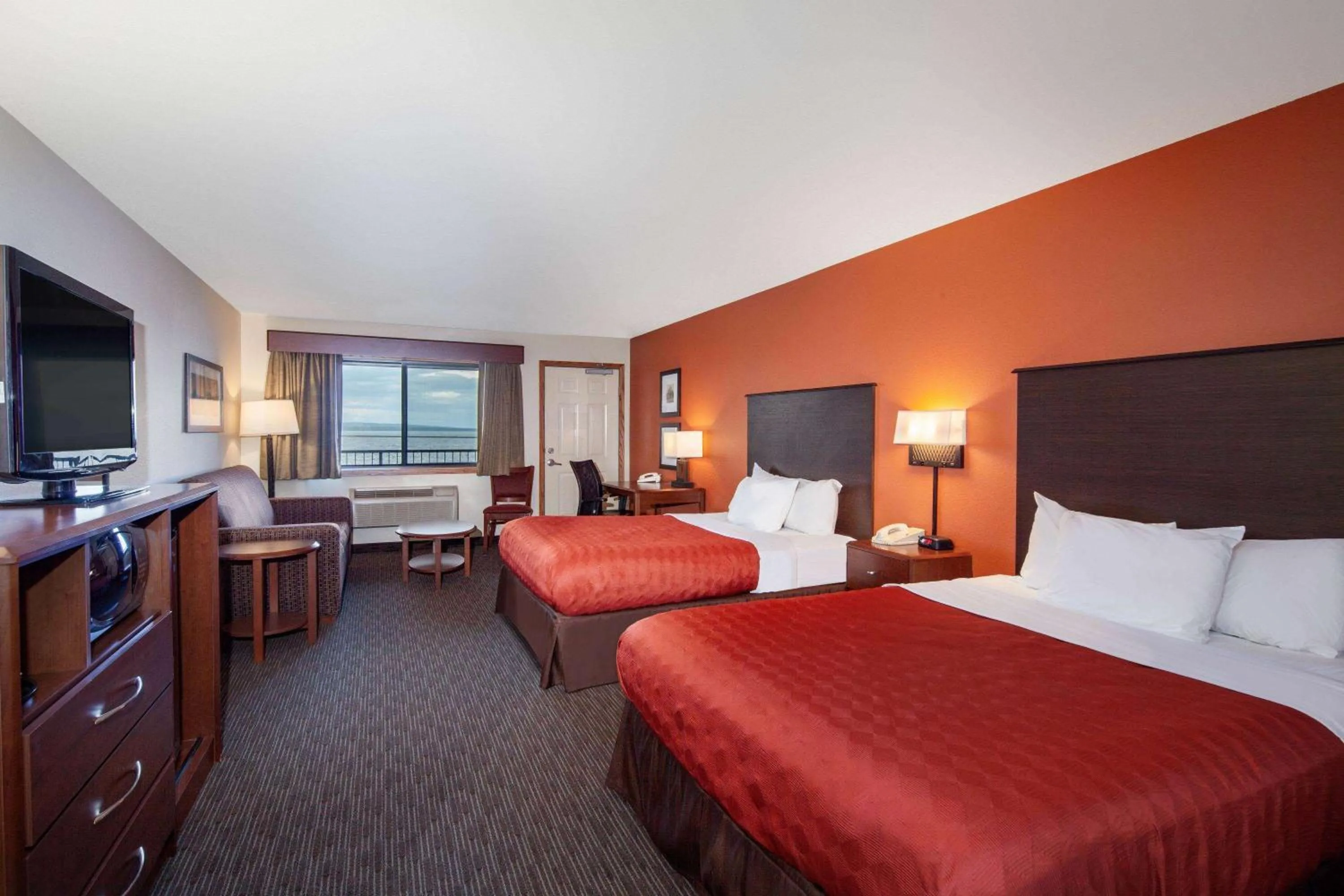 Bed in AmericInn by Wyndham Ashland