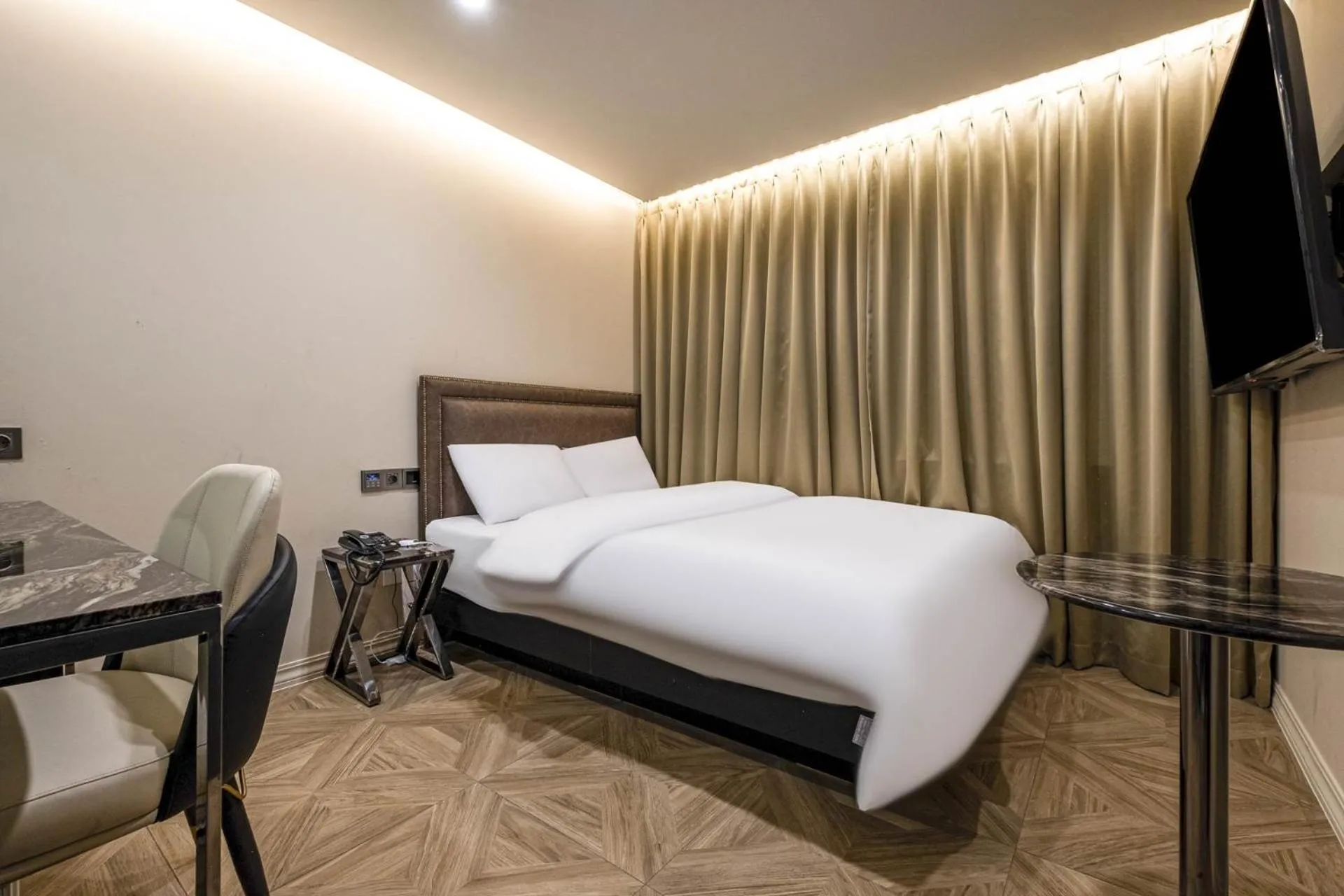 Bed in Heritage31 Hotel