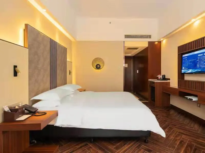 Bed in Metropolo Hotel Zhenjia Wanda Plaza Railway Station