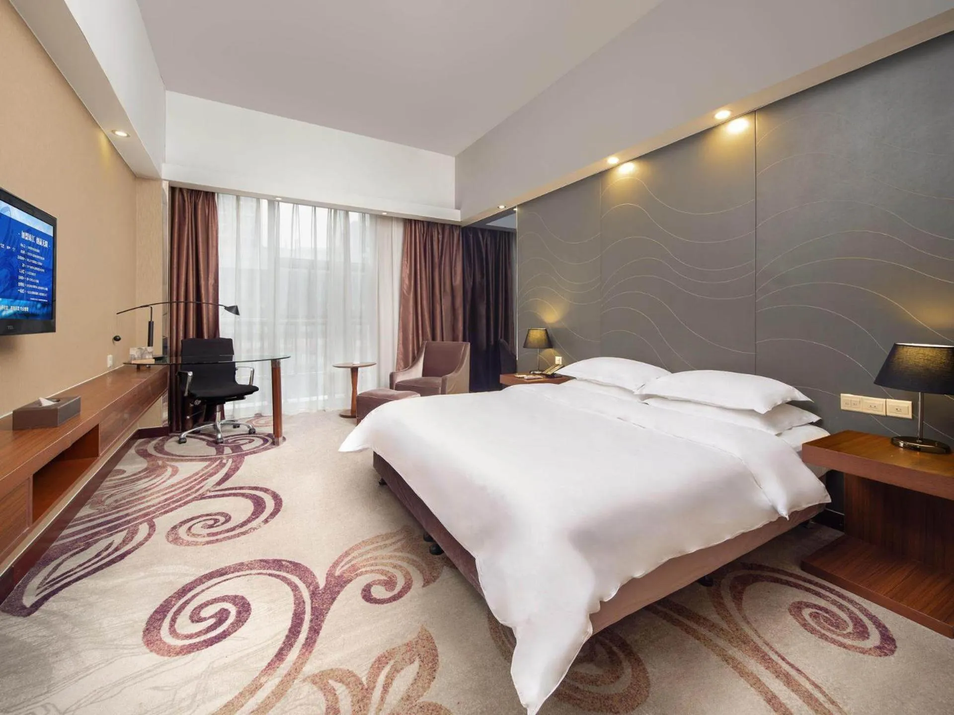 Bed in Metropolo Hotel Zhenjia Wanda Plaza Railway Station