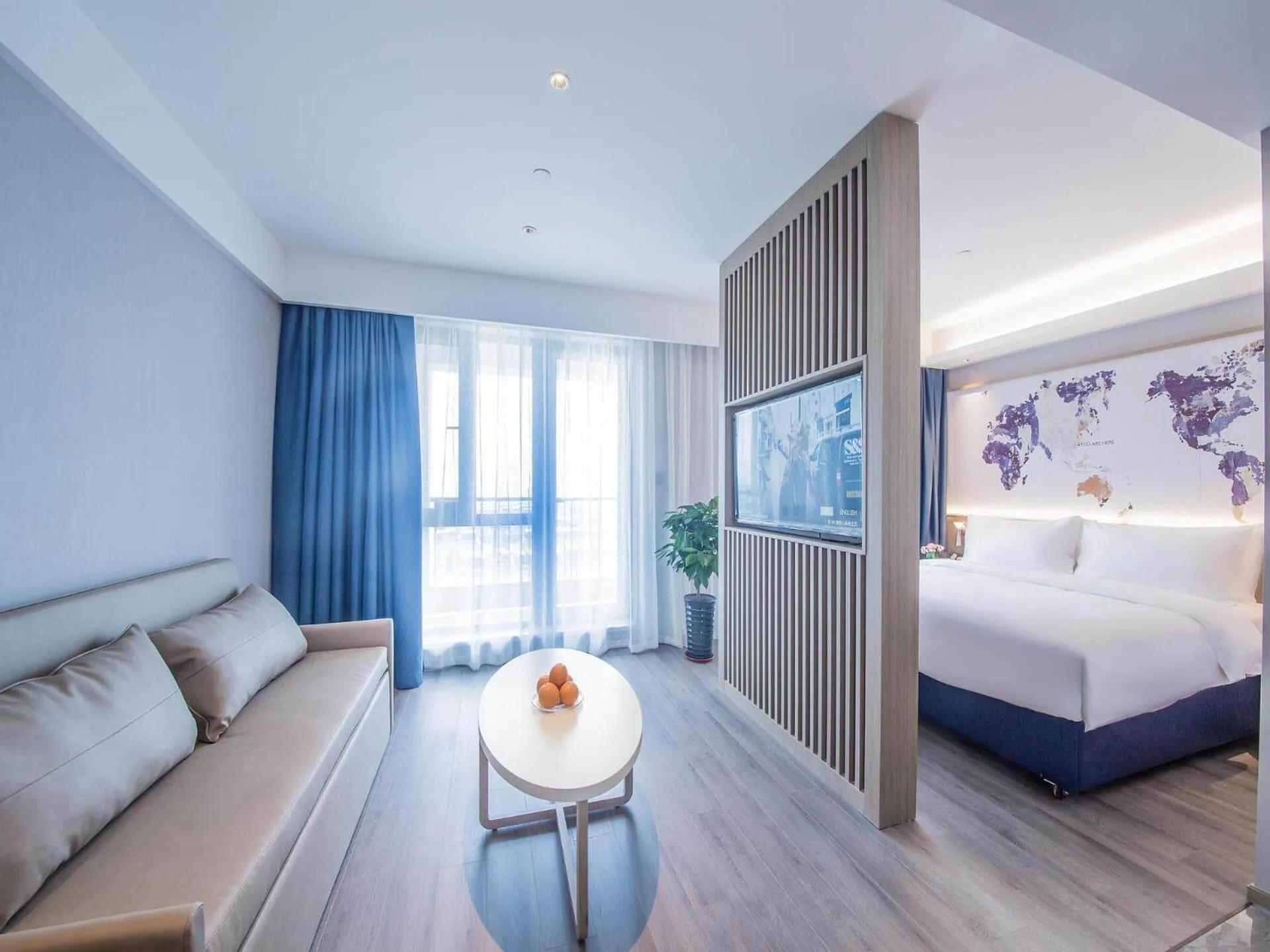 Bed in Kyriad Marvelous Hotel Qinhuangdao Nandaihe