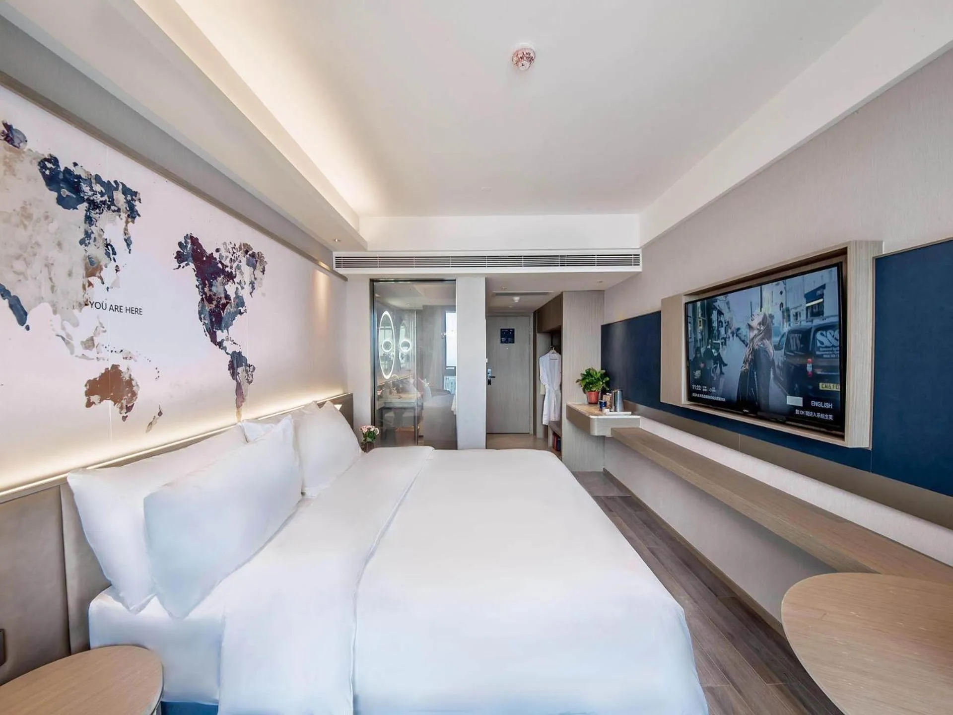 Bed in Kyriad Marvelous Hotel Qinhuangdao Nandaihe