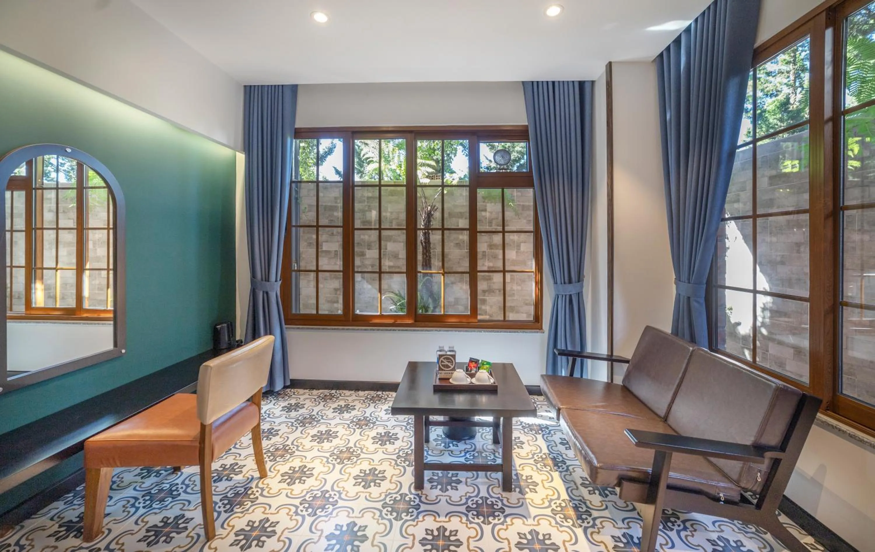 Seating area in Brick House Dalat Hotel