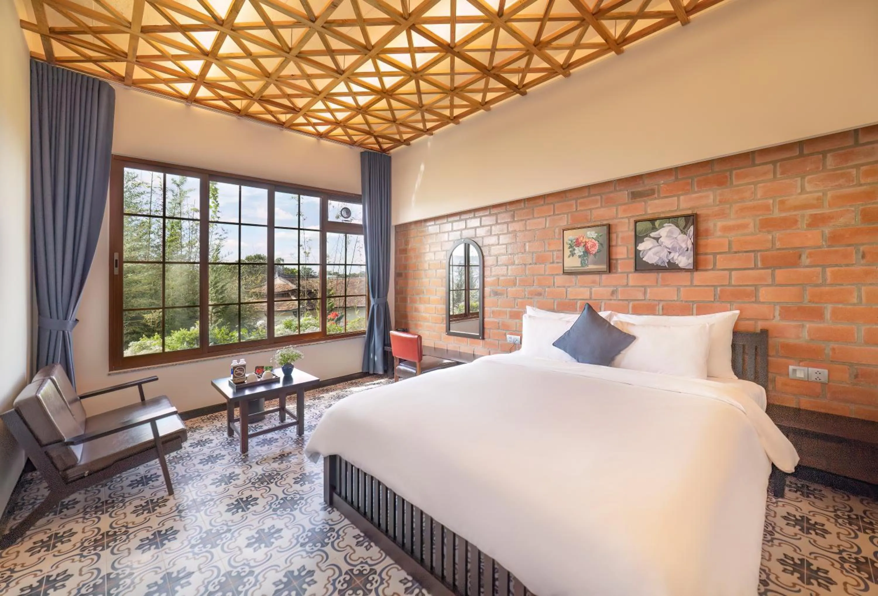 Bed in Brick House Dalat Hotel