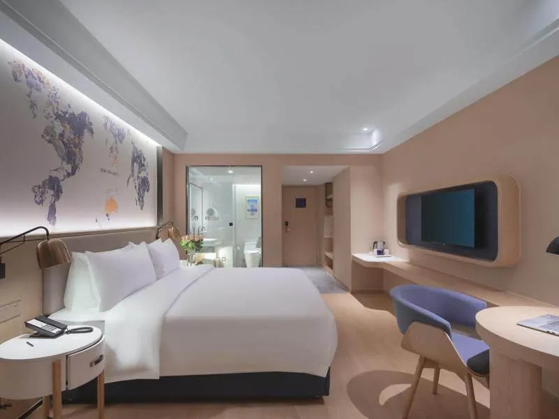 Bed in Kyriad Marvelous Hotel Suzhou Wujiang People Square