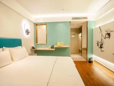 Bed in Magnotel Hotel Yangzhou Jinghua Wangyue Road