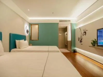 Bed in Magnotel Hotel Yangzhou Jinghua Wangyue Road