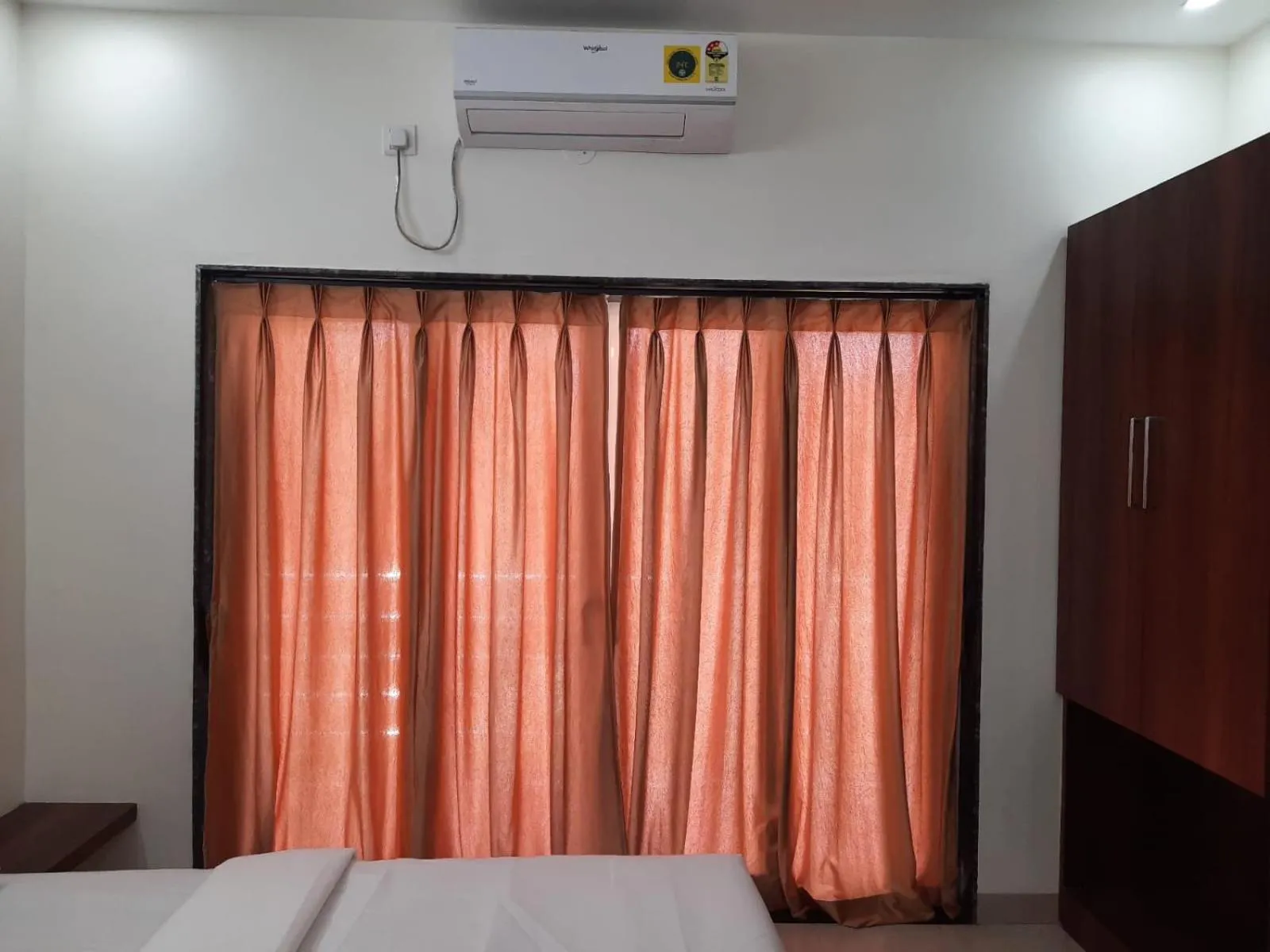 air conditioner, Bed in Raapan Beach Resort