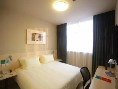 Bed in Jinjiang Inn Yangzhou Gaoyou East Haichao Road