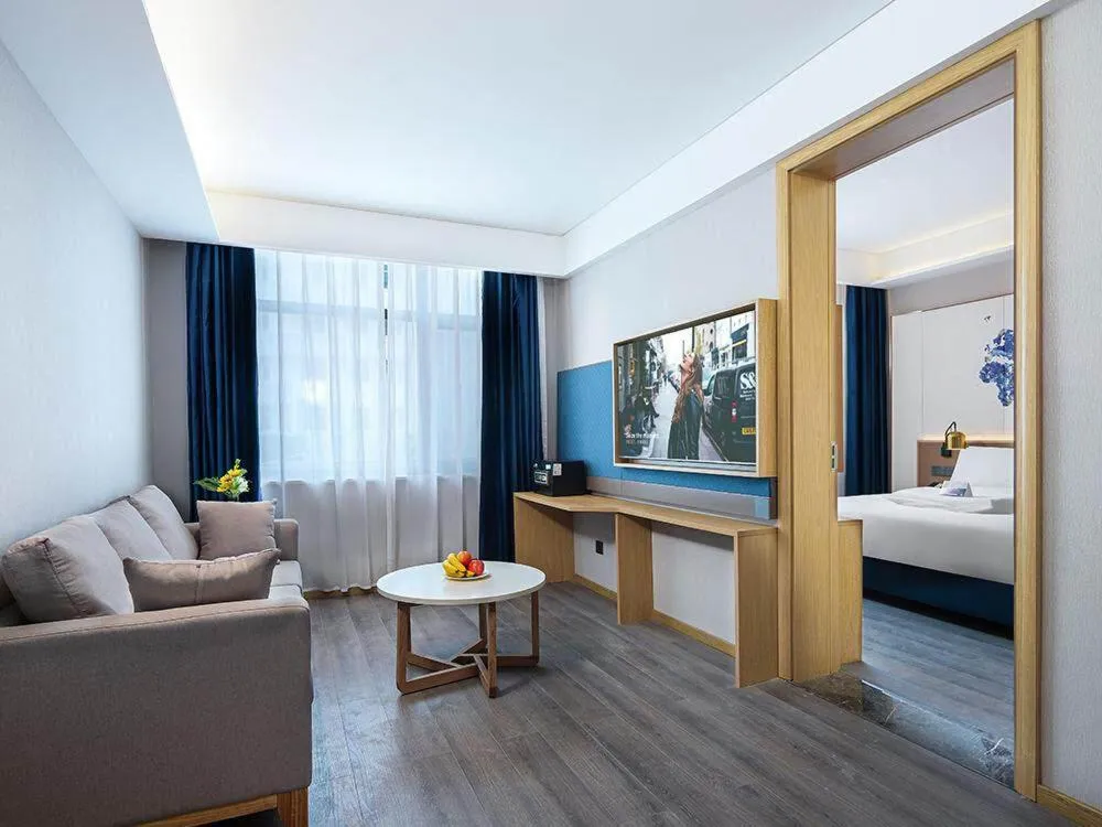 Bed in Kyriad Marvelous Hotel Weihai Happy Gate Weigao Plaza