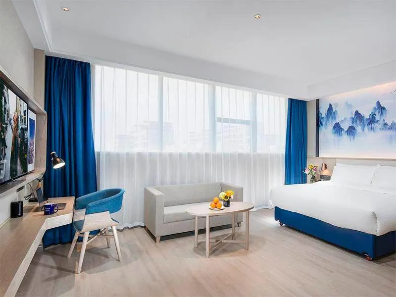 Bed in Kyriad Hotel Luoyang Longmen Railway Station