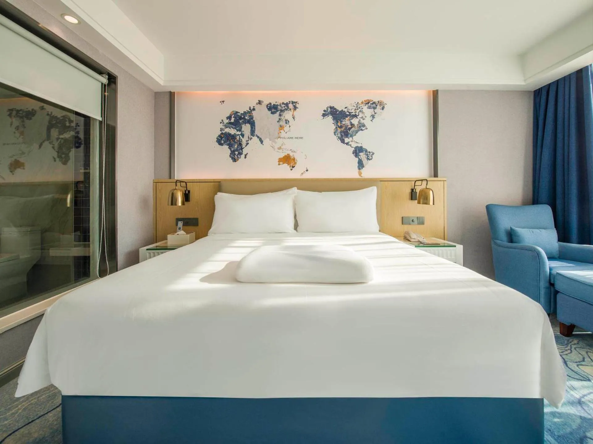 Bed in Kyriad Marvelous Hotel Qingyuan City Square