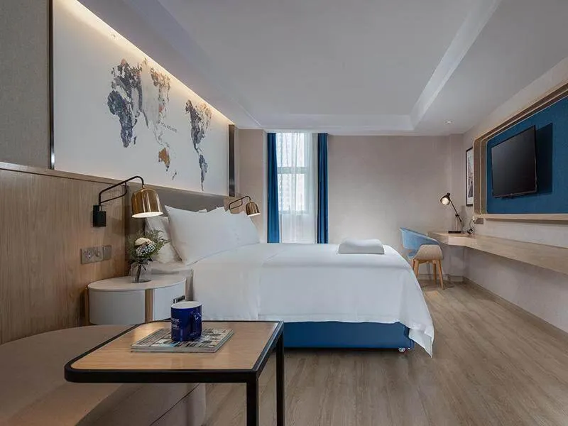 Bed in Kyriad Marvelous Hotel Huizhou South Station Danshui YI Center