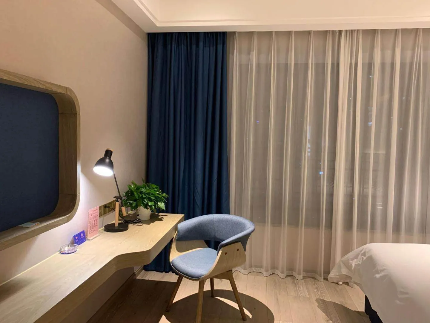 Bed in Kyriad Marvelous Hotel Heyuan Hakka Culture Park