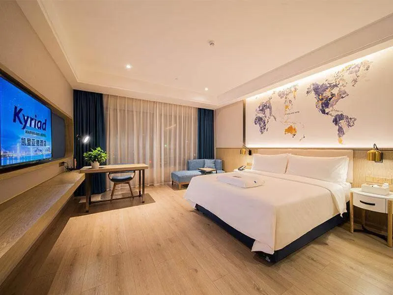Bed in Kyriad Marvelous Hotel Heyuan Hakka Culture Park